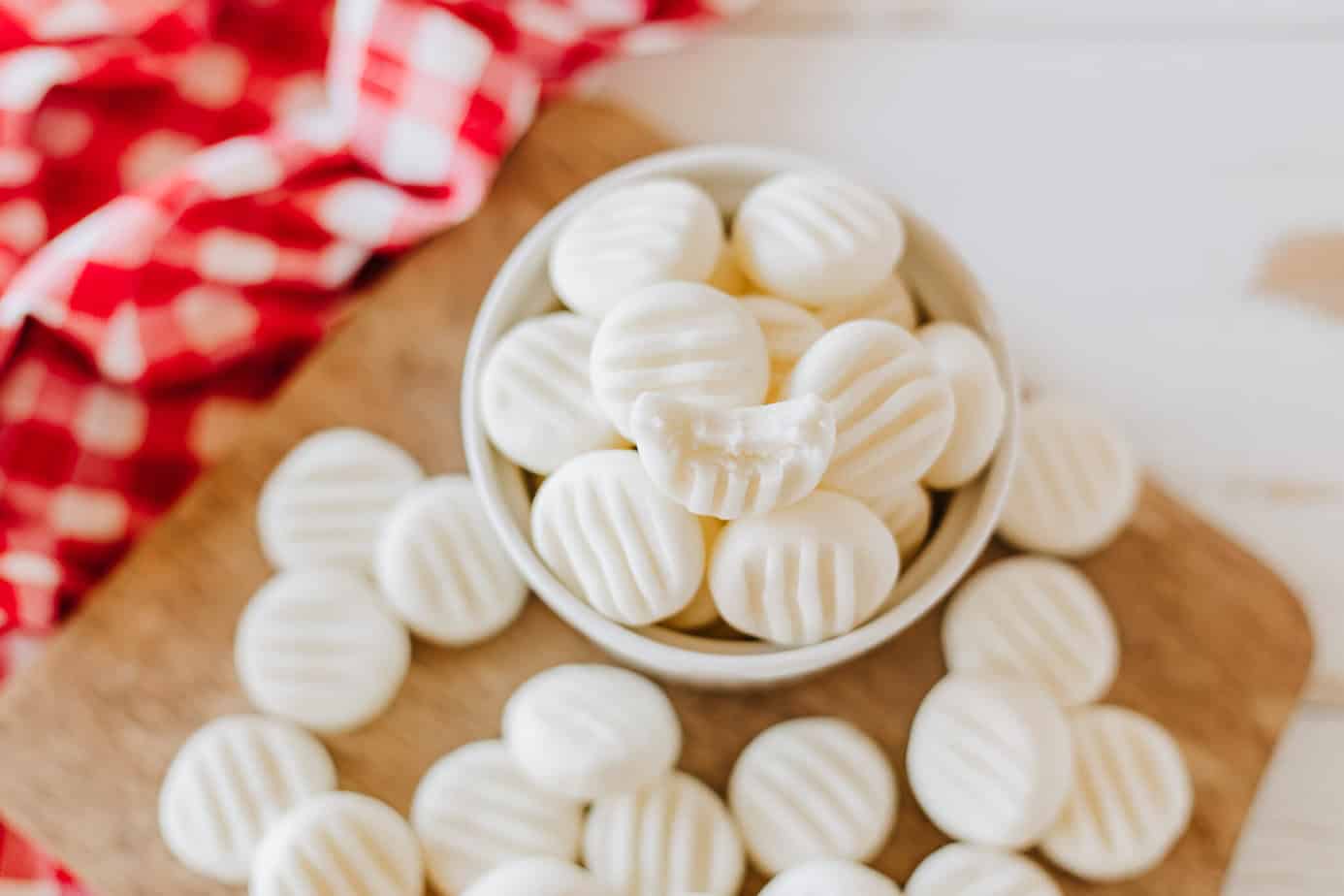 cream cheese mints in a white bowl