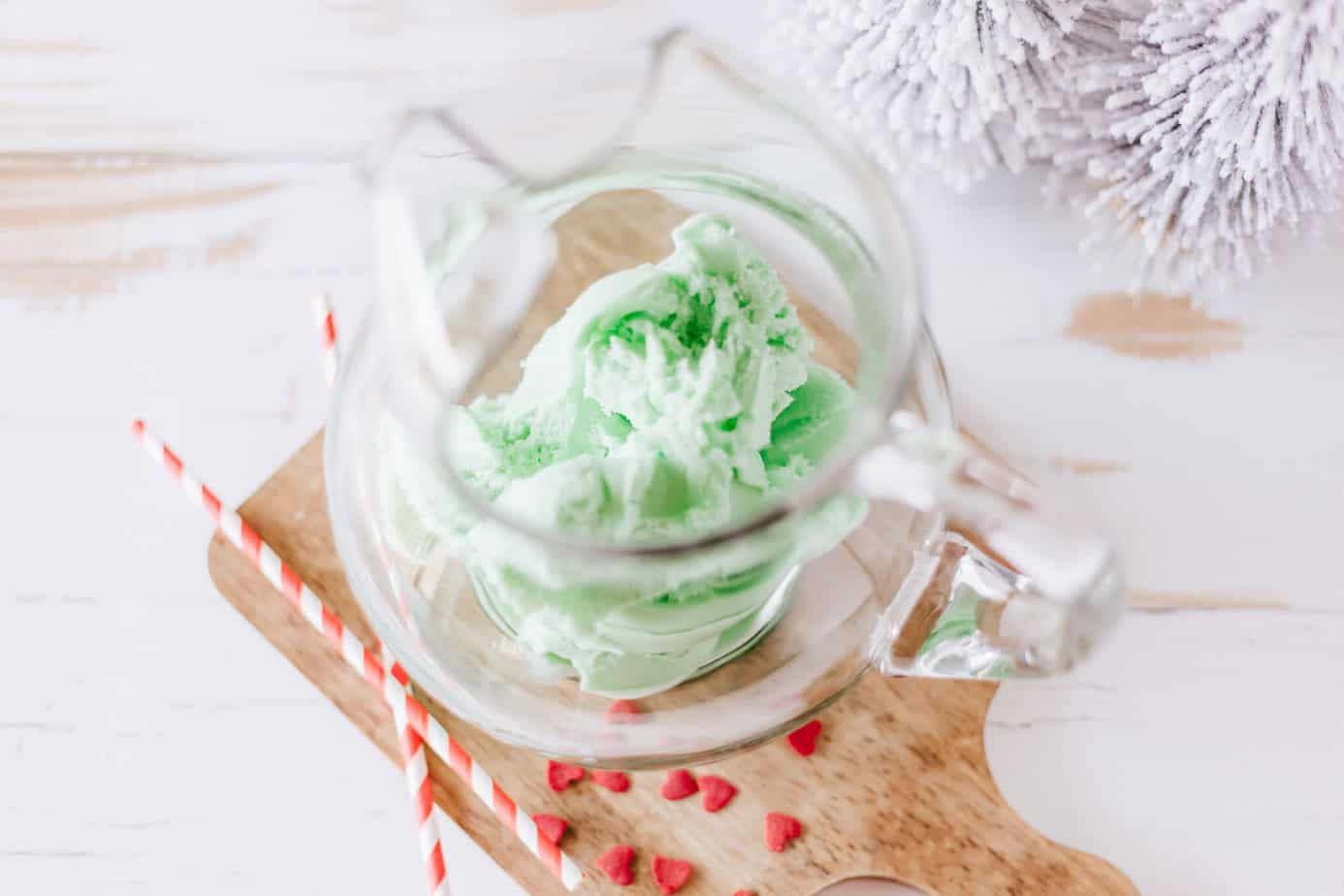 lime green sherbet in bottom of a pitcher