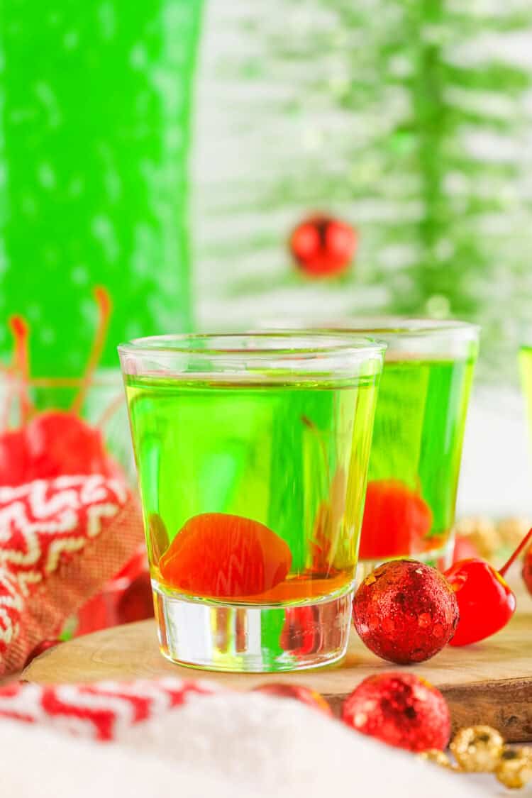 grinch shots with maraschino cherries