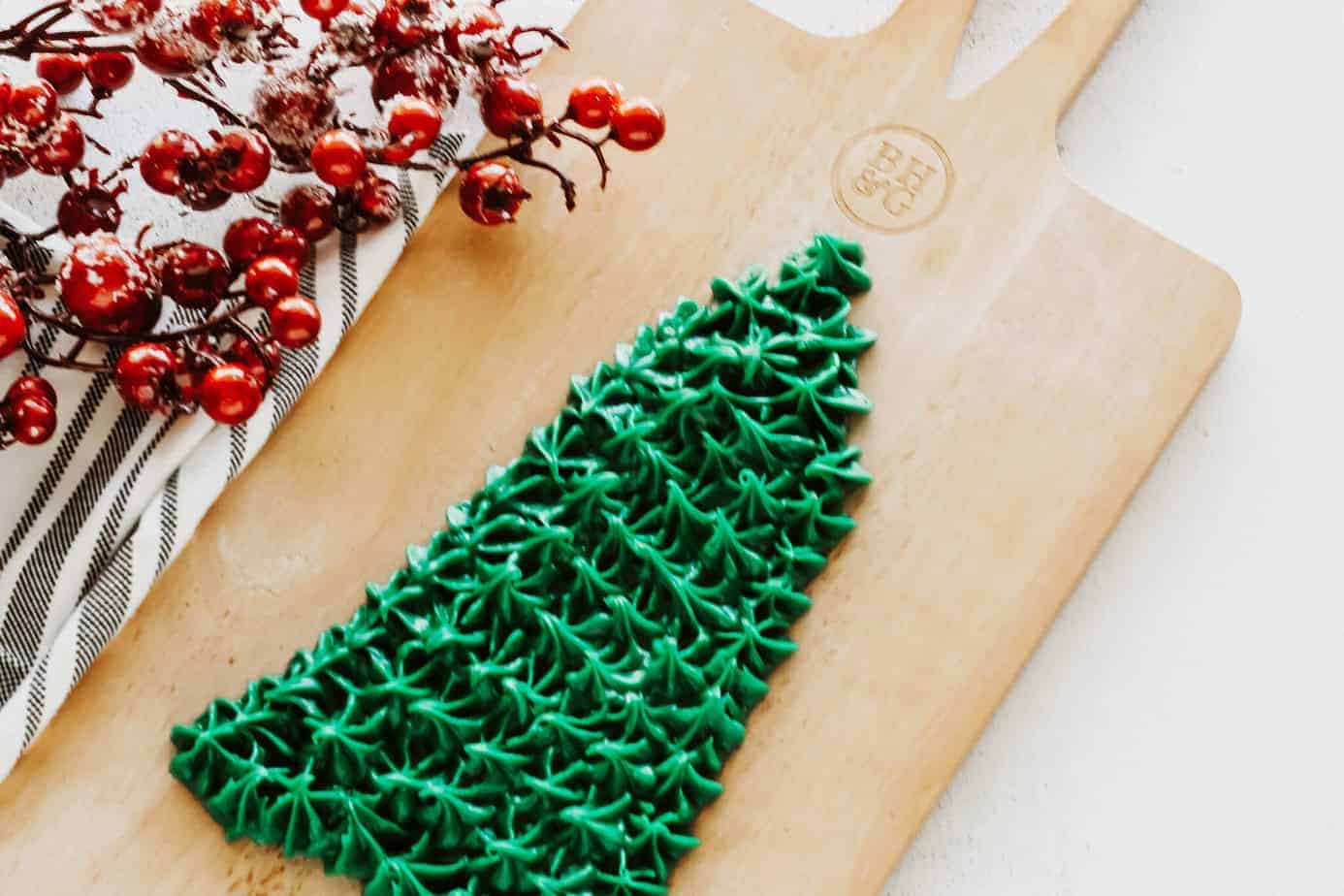 almost completely piped christmas frosting board