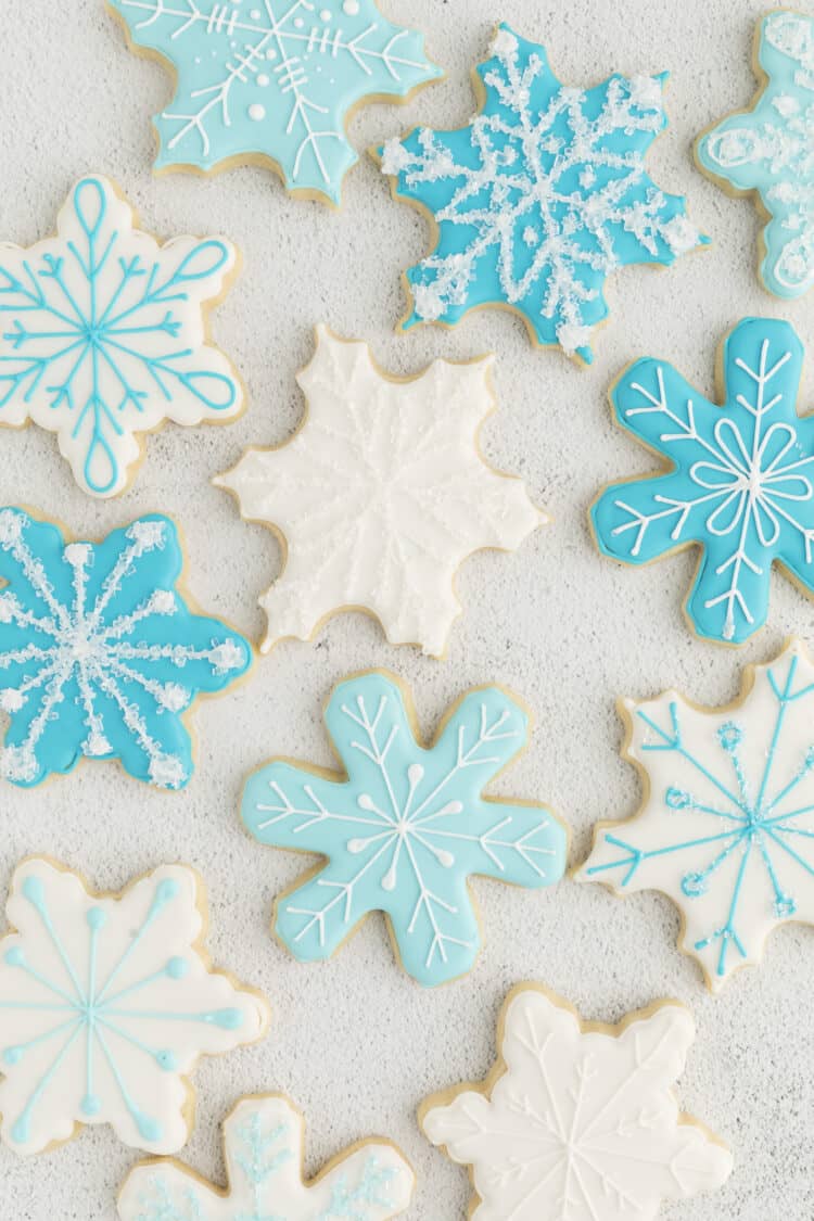 blue and white snowflake cookies with royal icing
