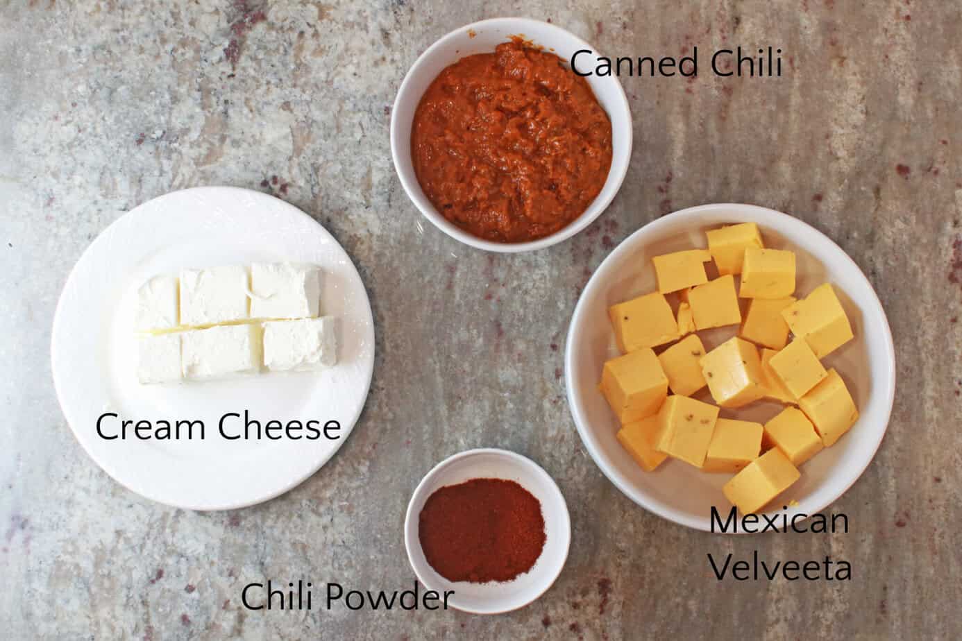 chili cheese dip ingredients in white dishes