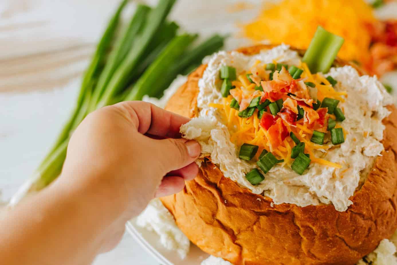 chicken bacon ranch crack dip in a bread bowl