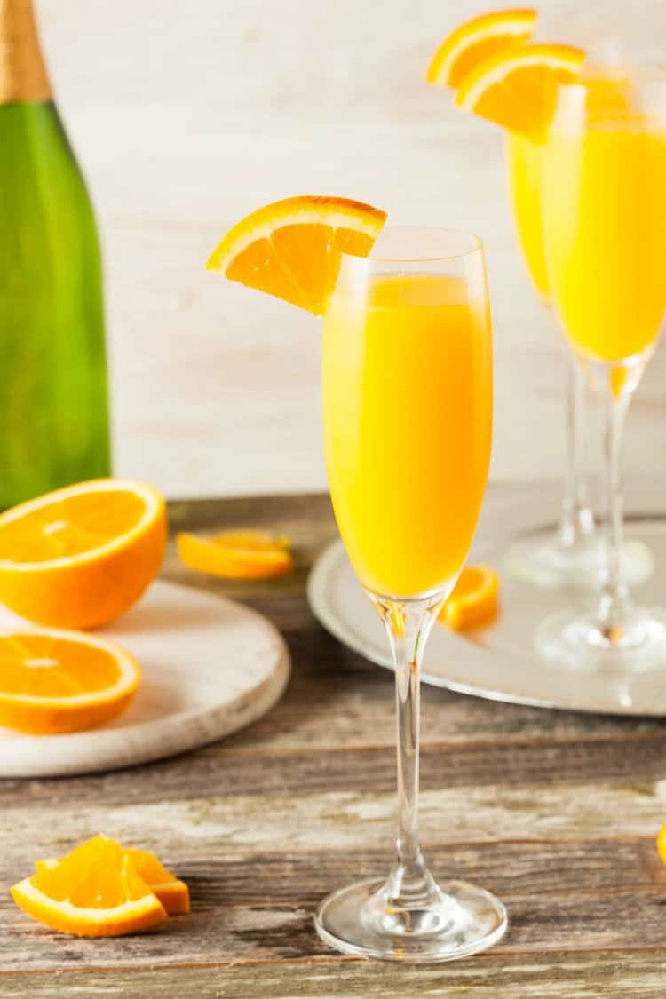 mimosas in champagne glasses