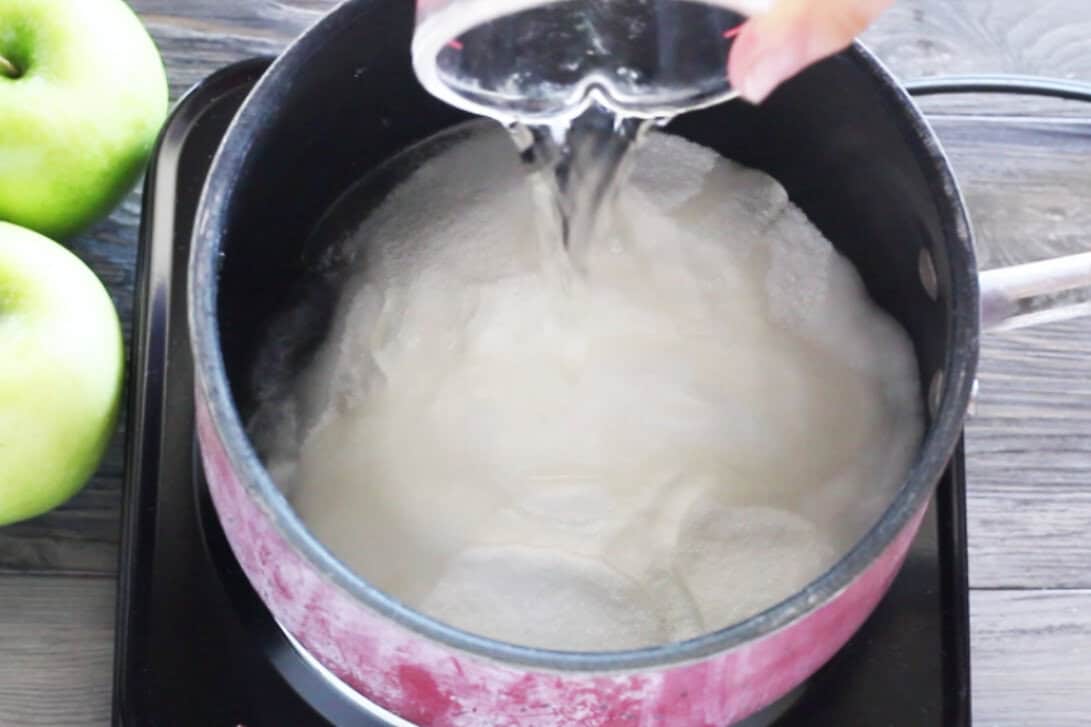 adding water to sugar and corn syrup
