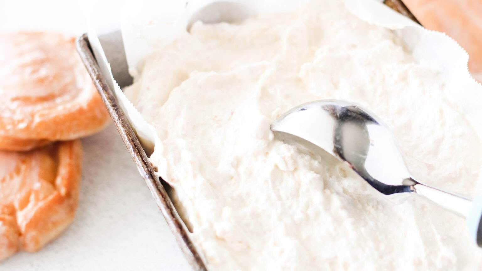 scooping out frozen honey bun ice cream