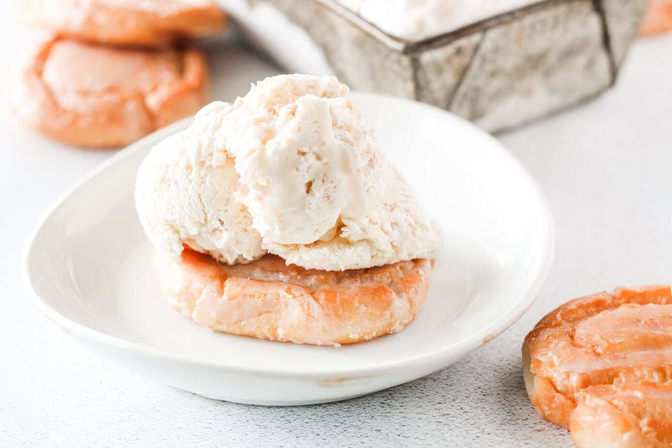 homemade little debbie honey bun ice cream scooped onto a honey bun