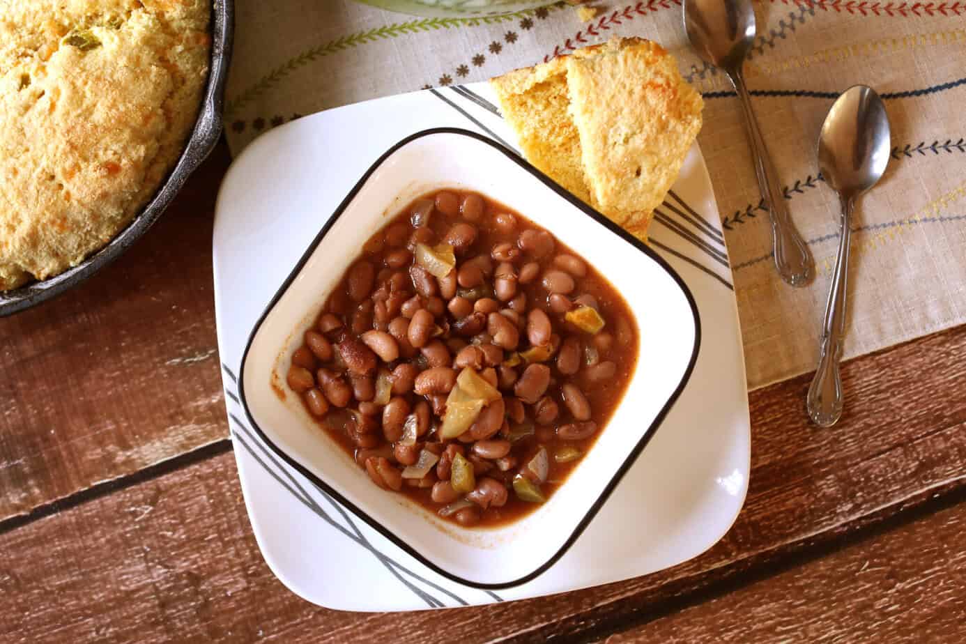 bbq baked beans in a white bowl
