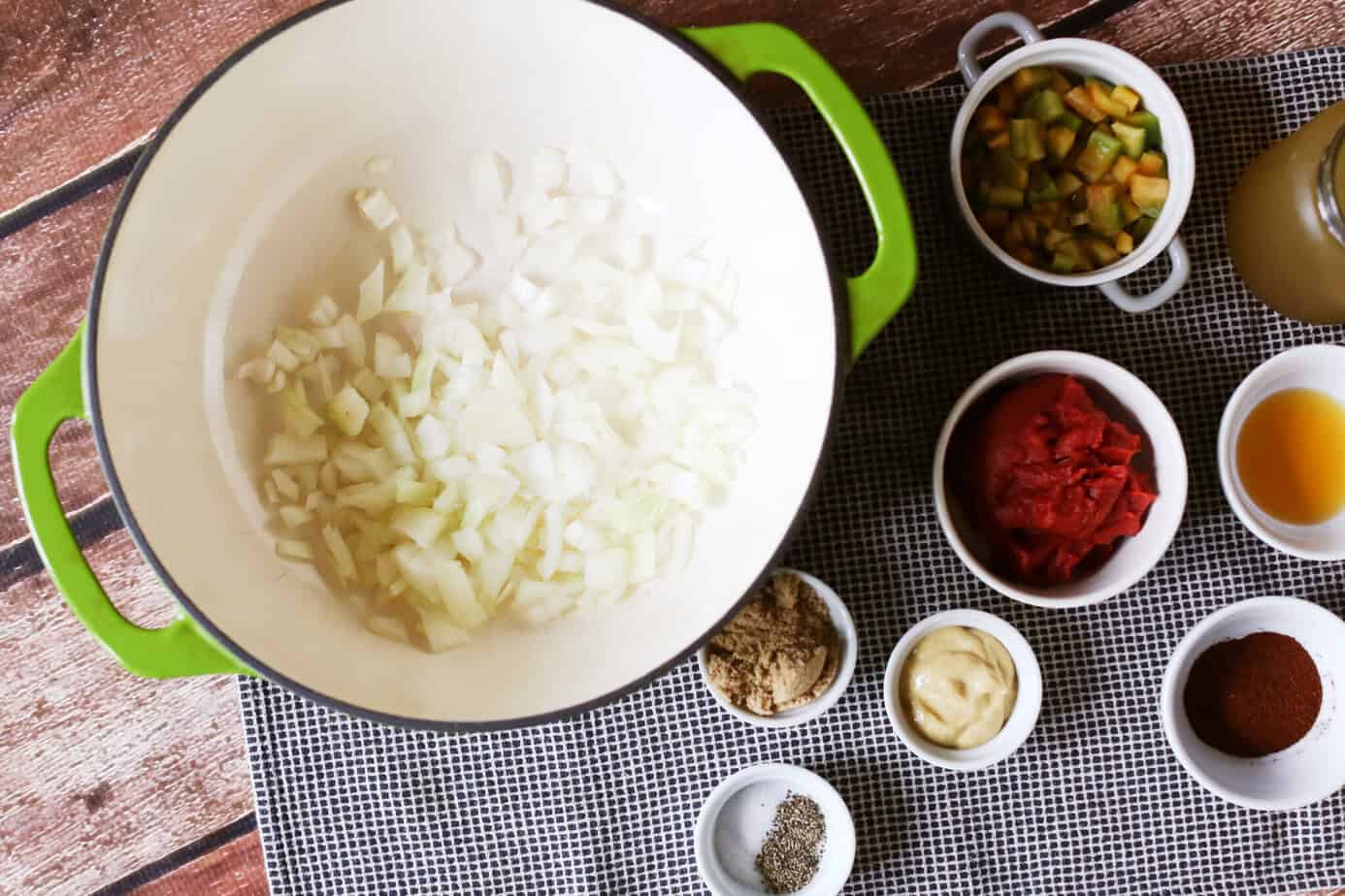 onions in pot with oil plus seasonings