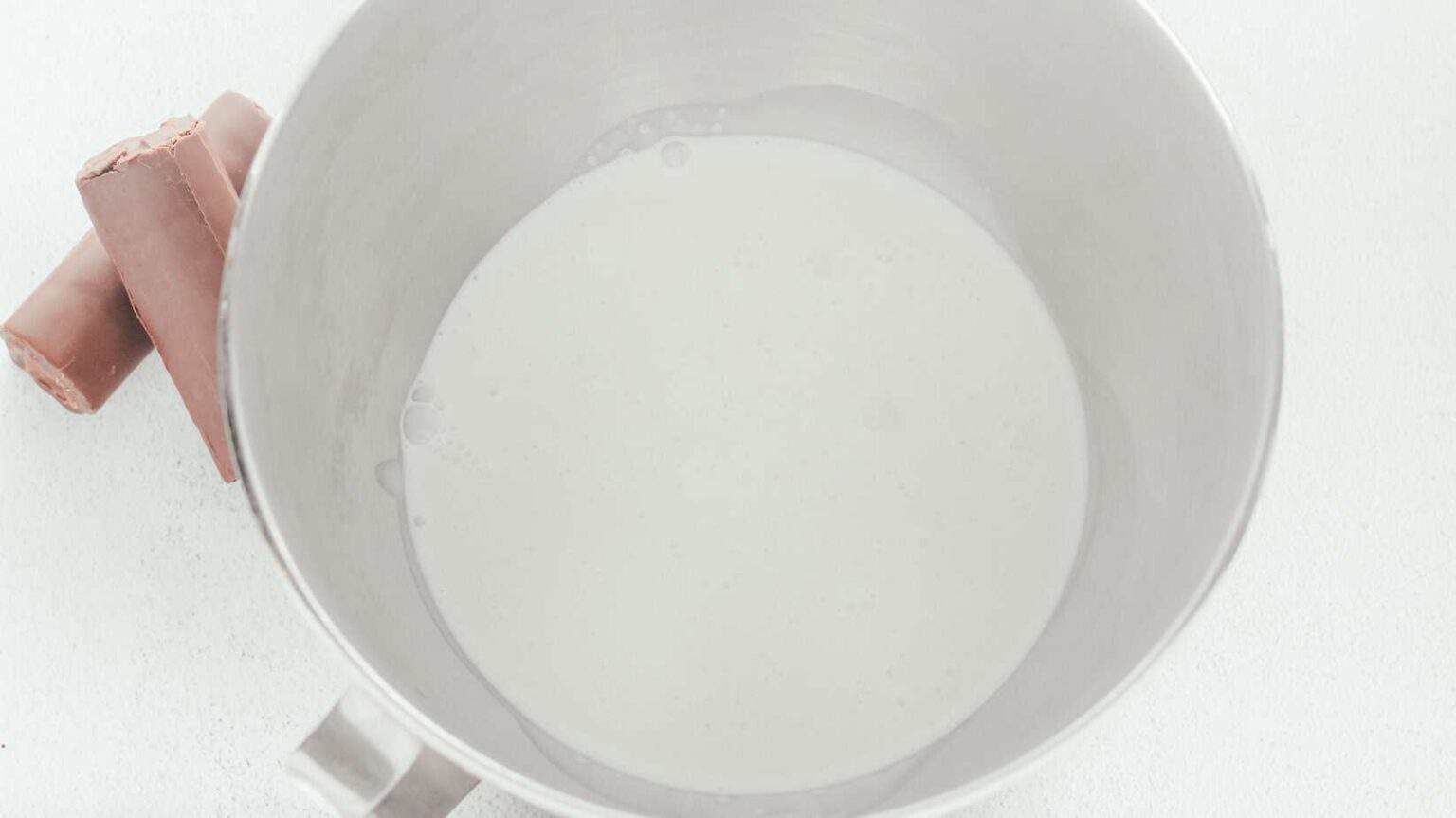 whipping cream in a mixer bowl