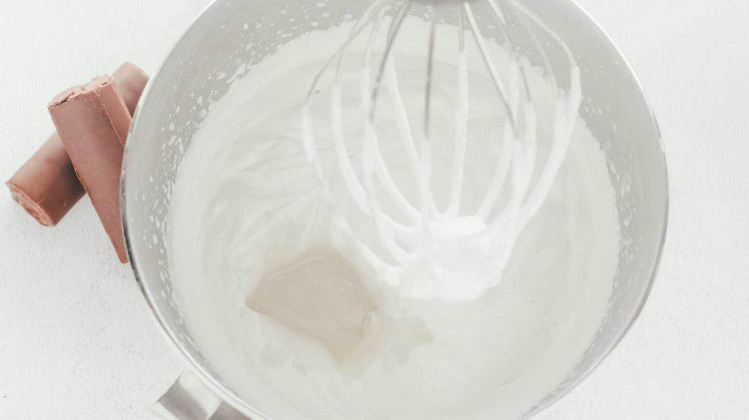 adding sweetened condensed milk to whipped cream