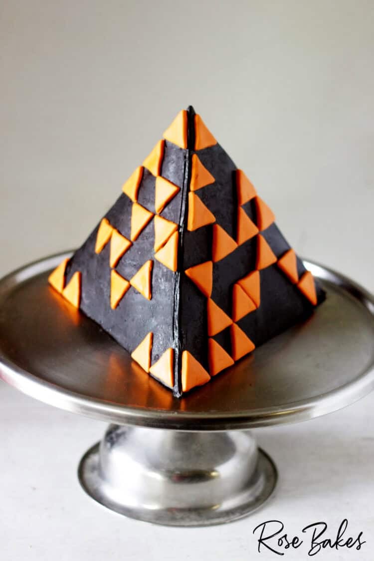 black and orange pyramid cake