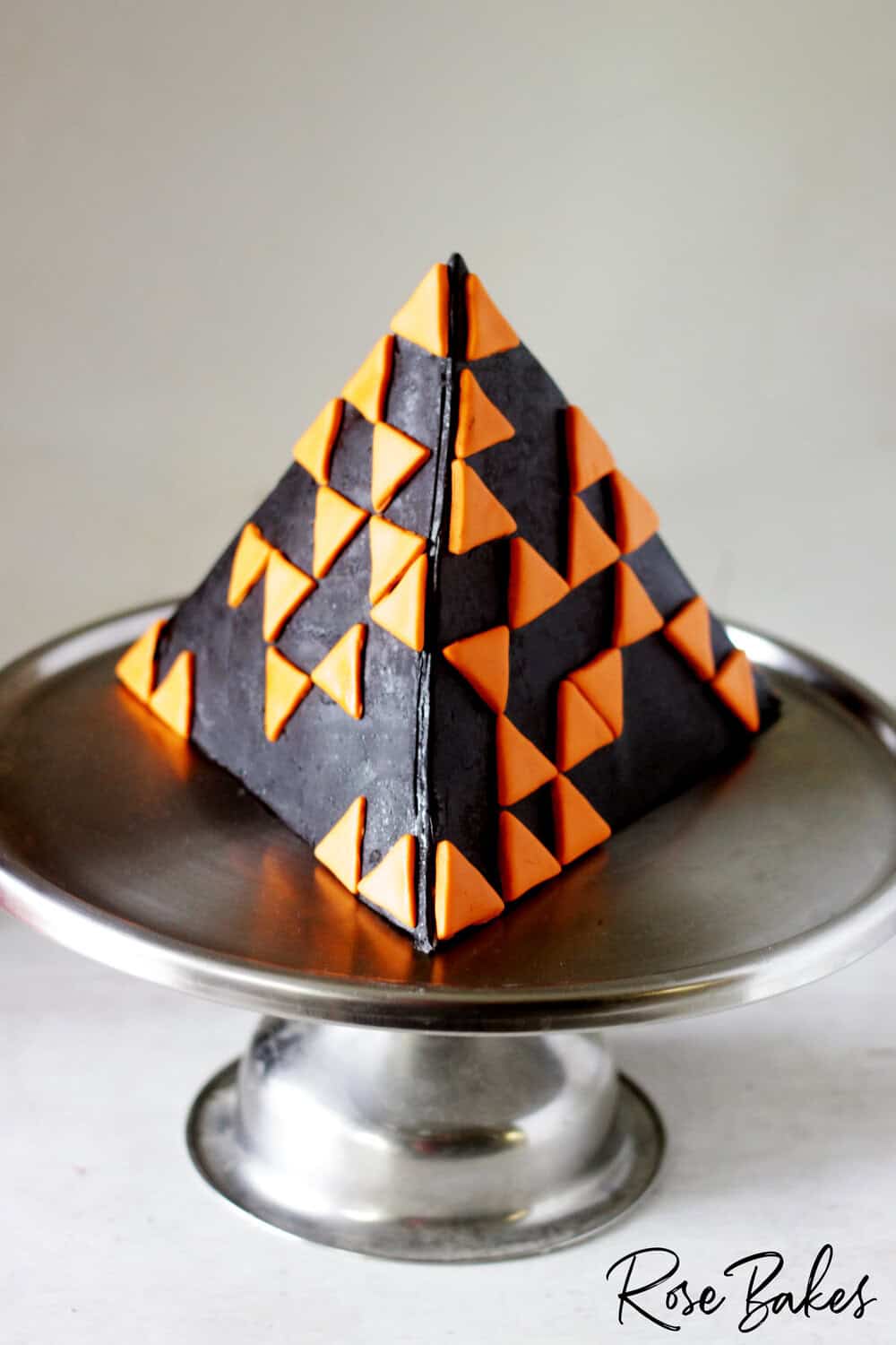 black and orange pyramid cake