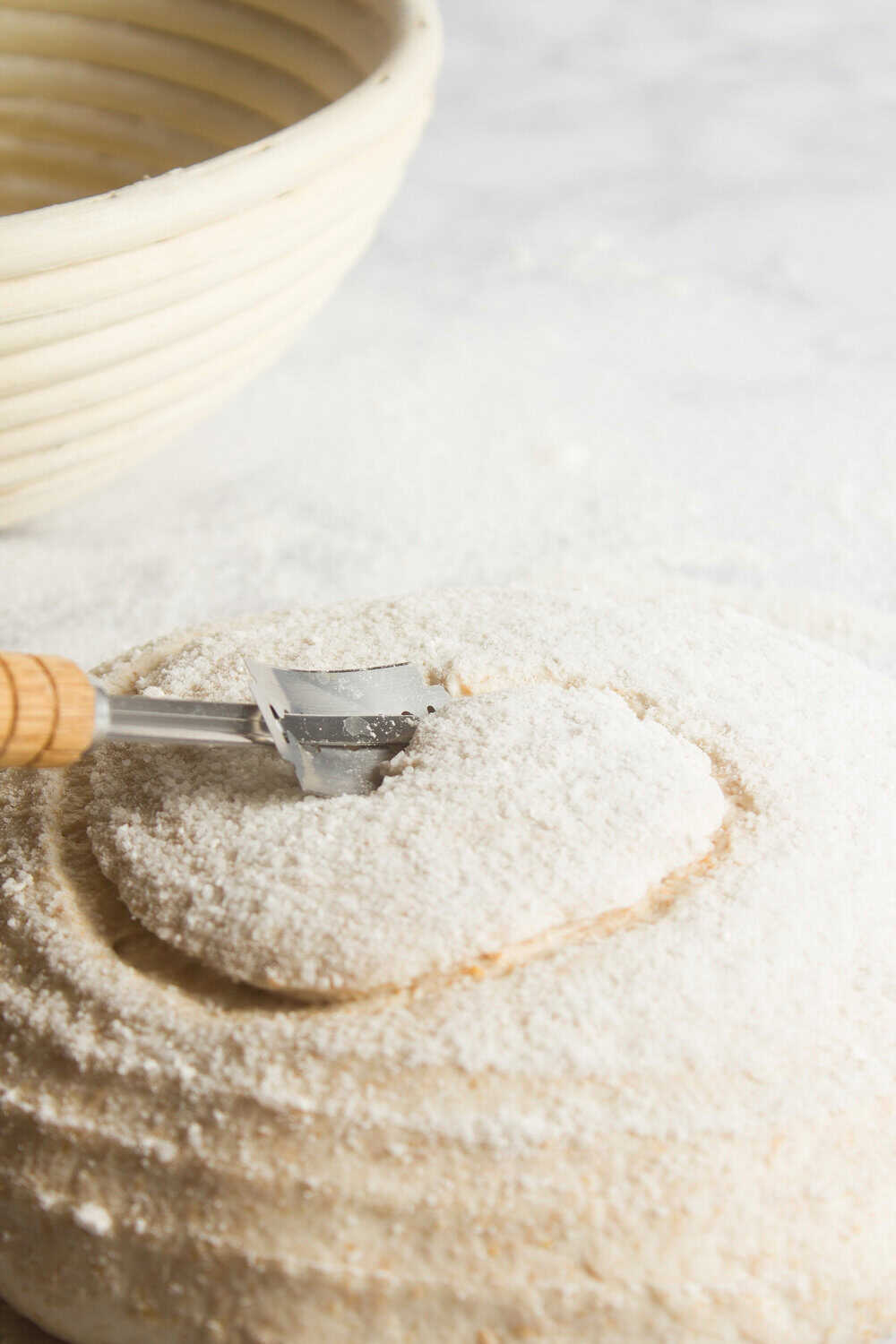 scoring the top of sourdough