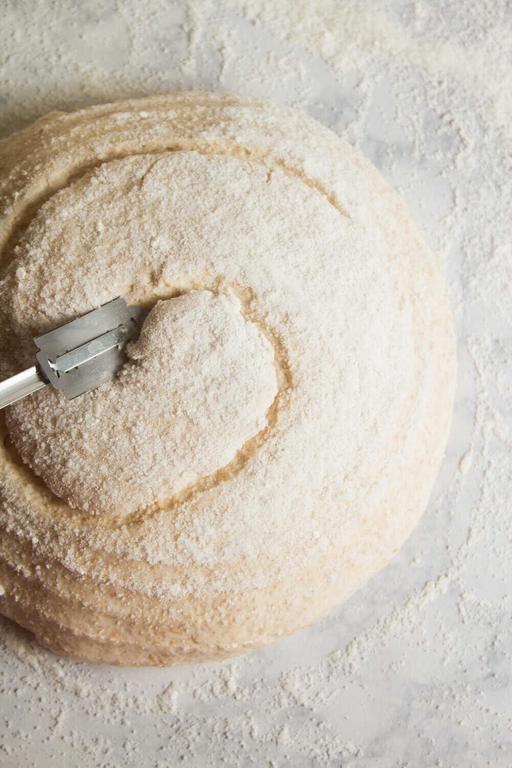 scoring the top of sourdough