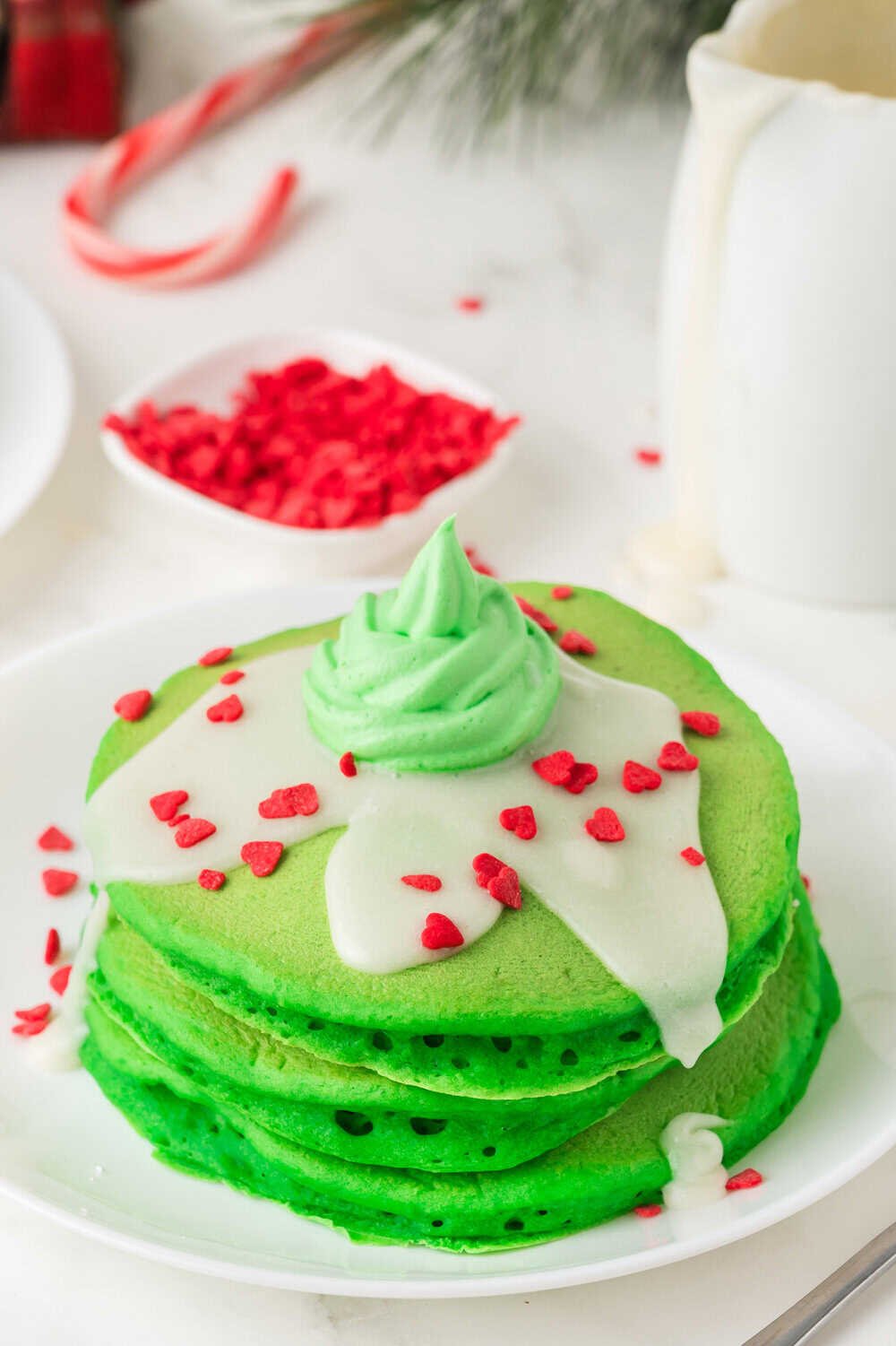 green grinch pancakes with cream cheese frosting