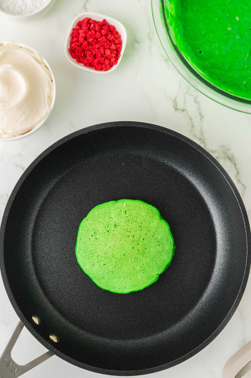green pancake in a skillet