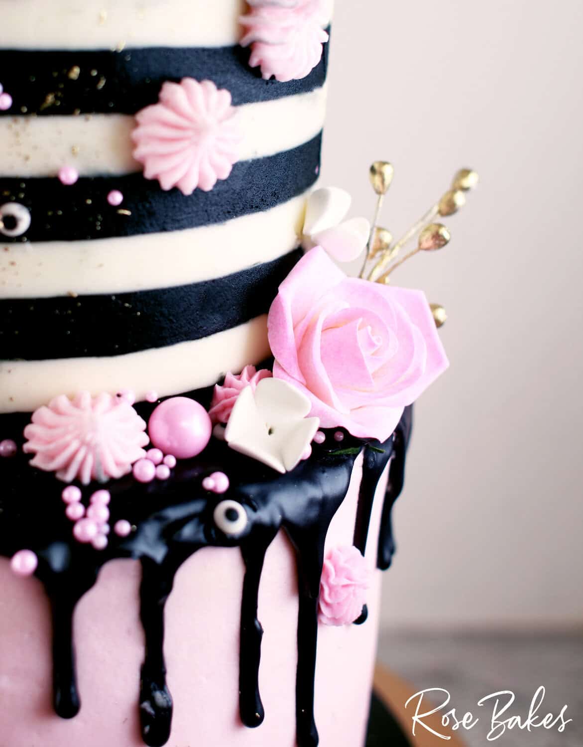 black and pink cake design