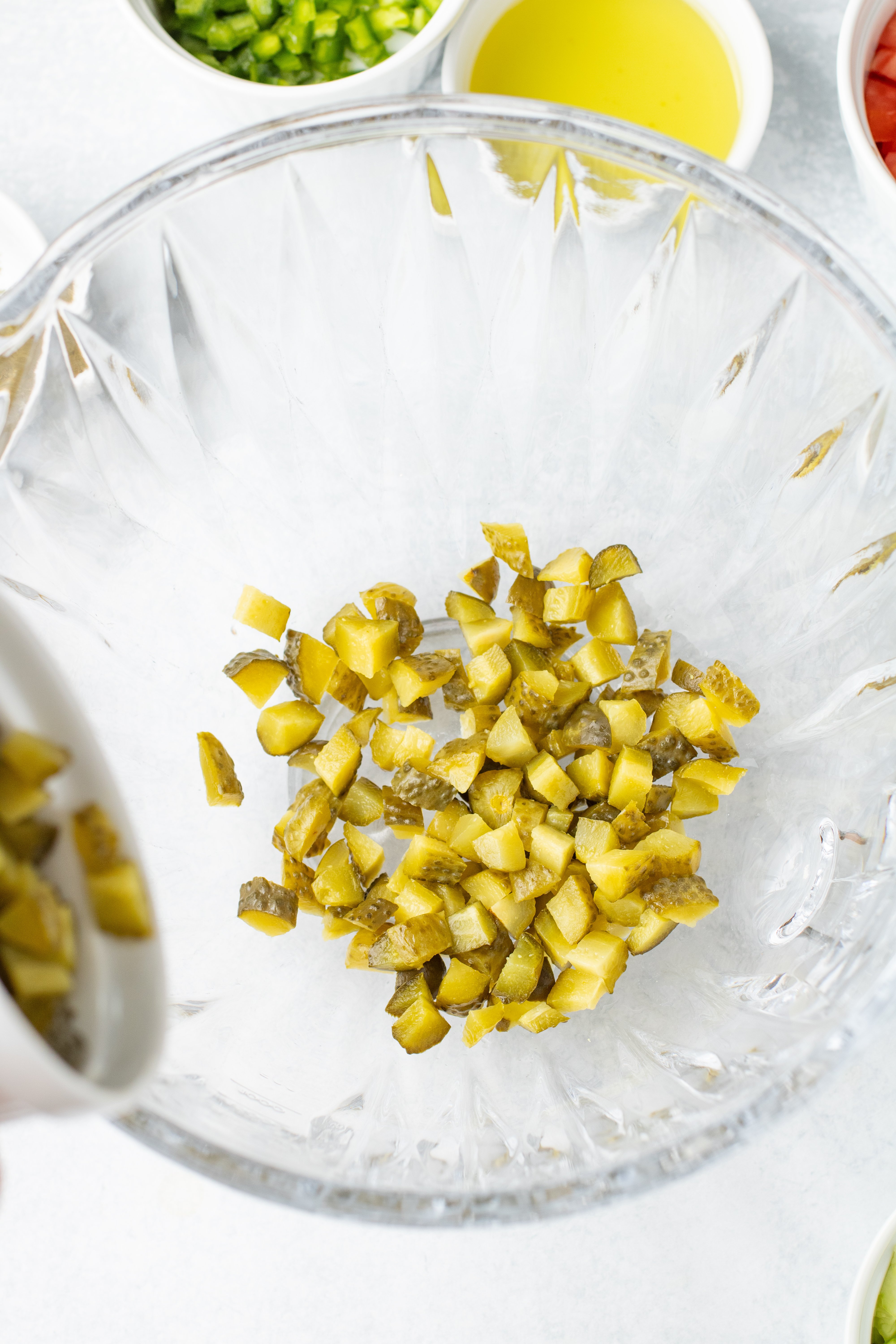 diced dill pickles in a bowl