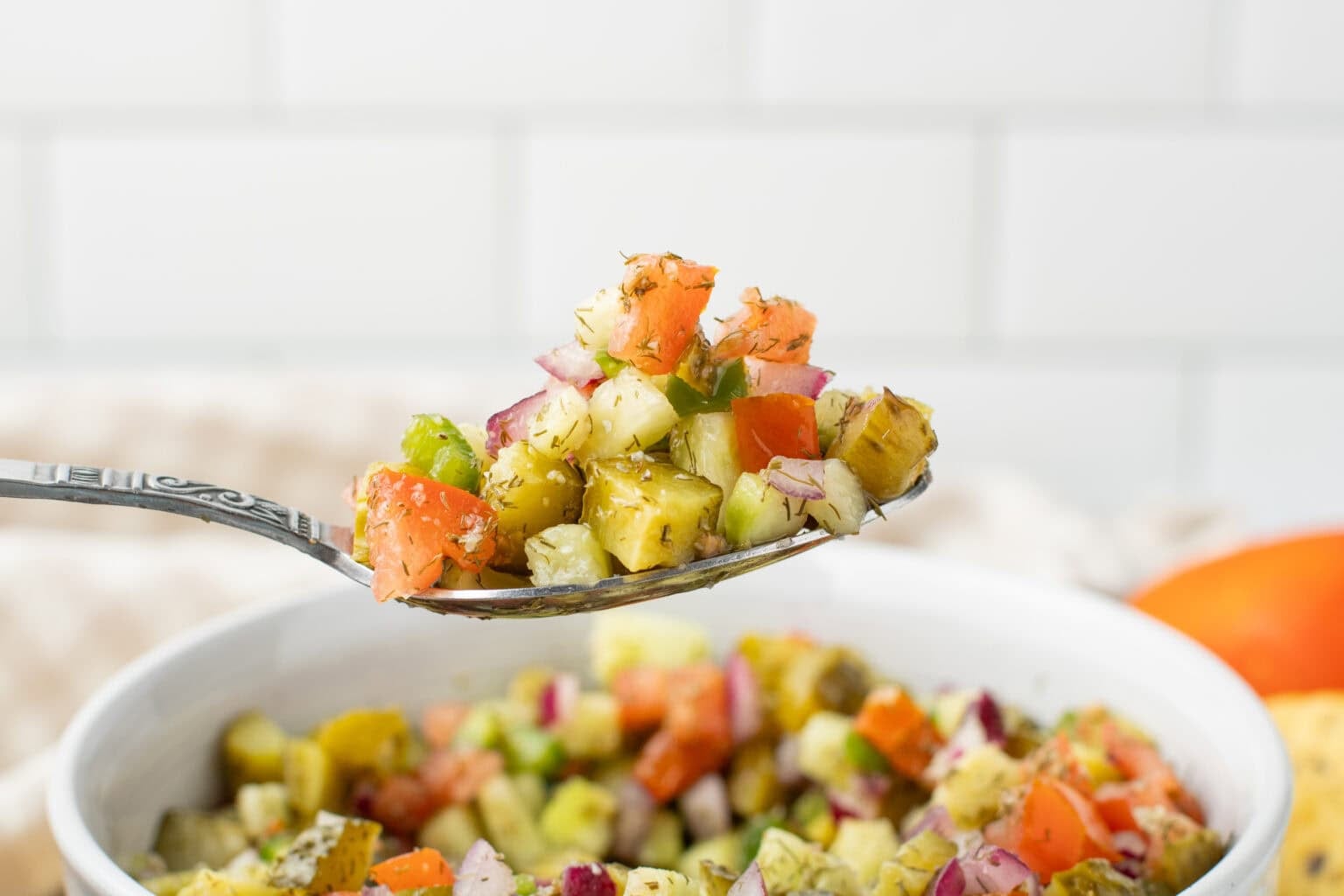 pickle de gallo pickle salsa on a spoon