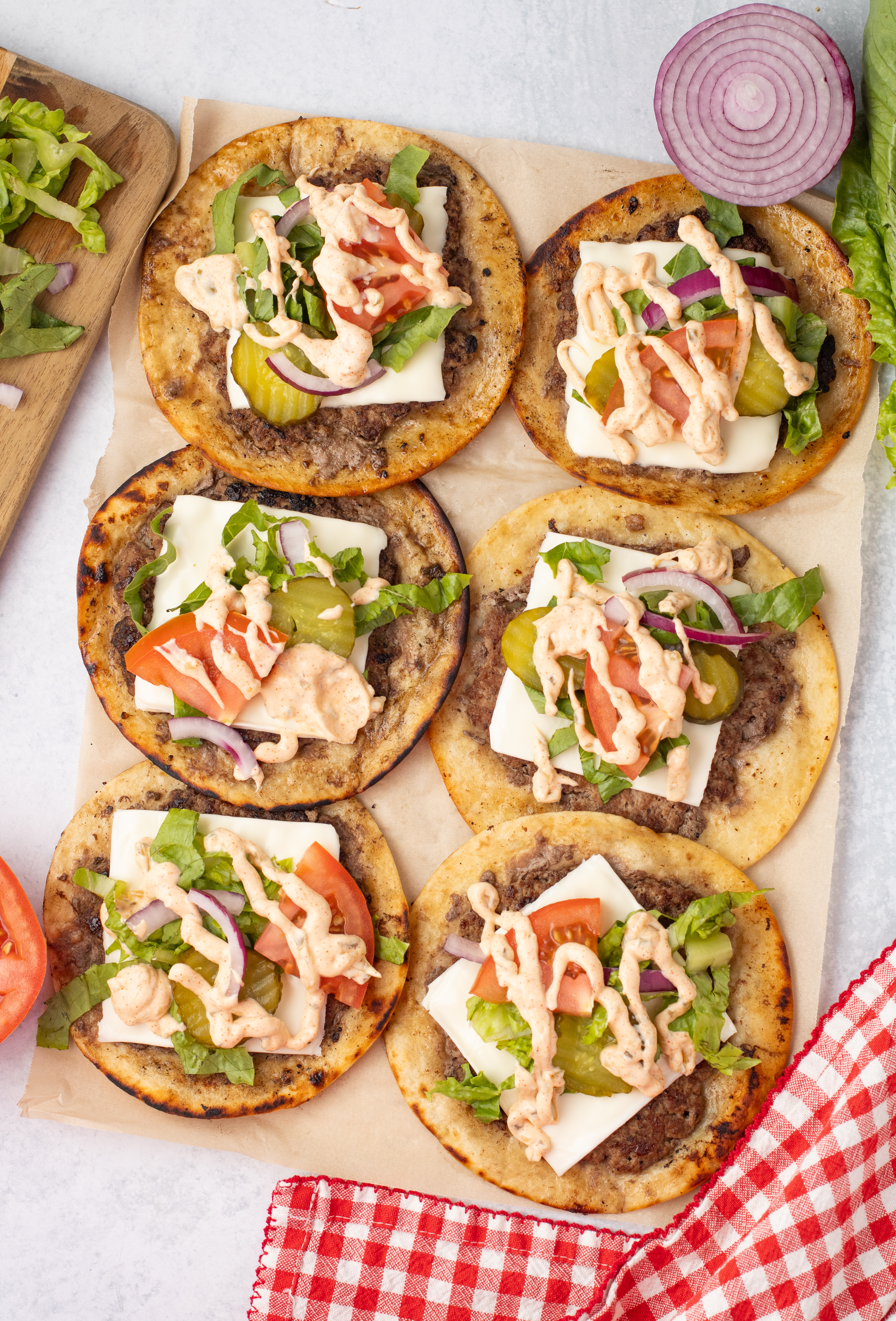 smashburger tacos with toppings and burger sauce
