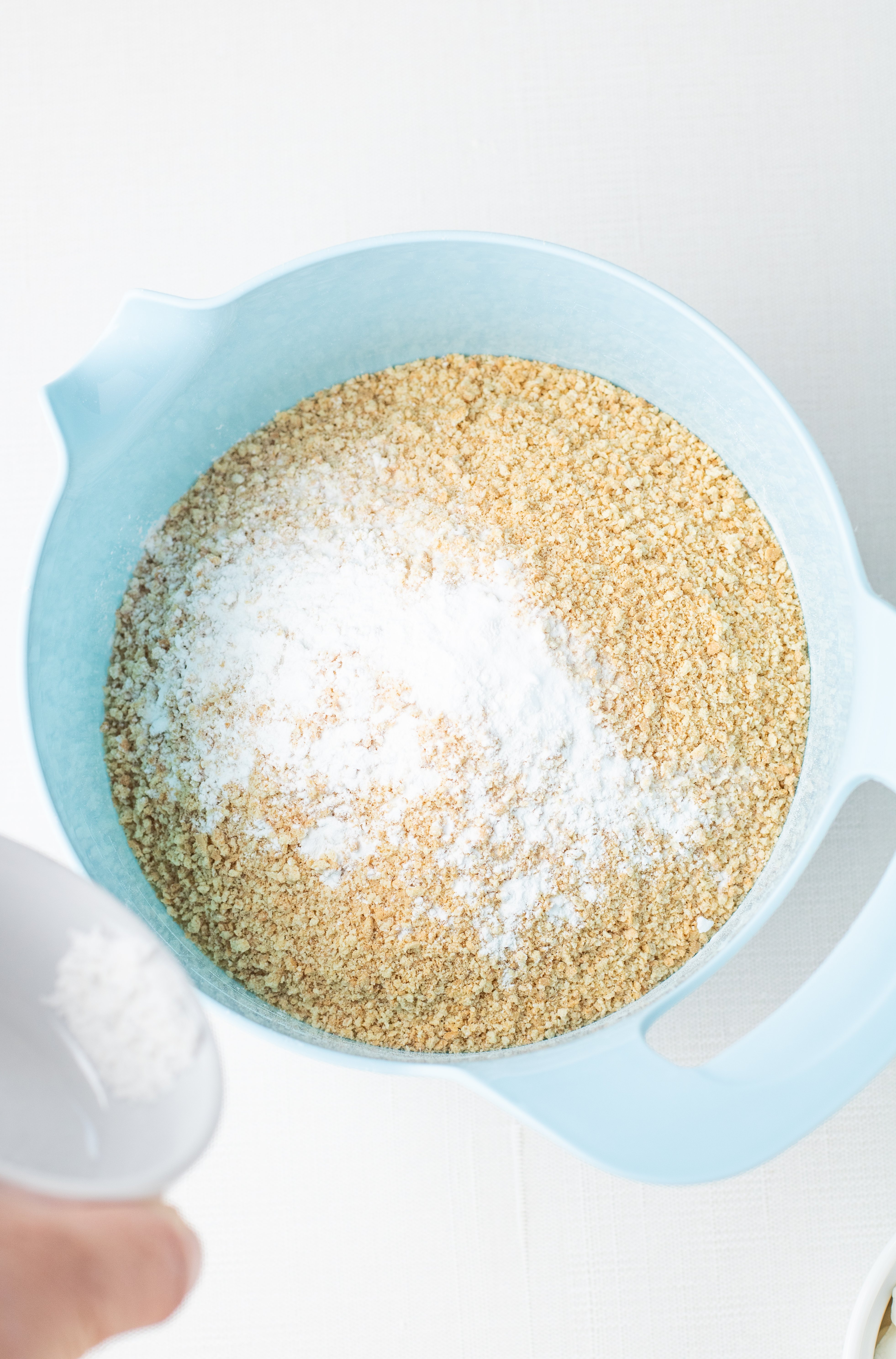 baking soda and baking powder added to flour and graham crackers