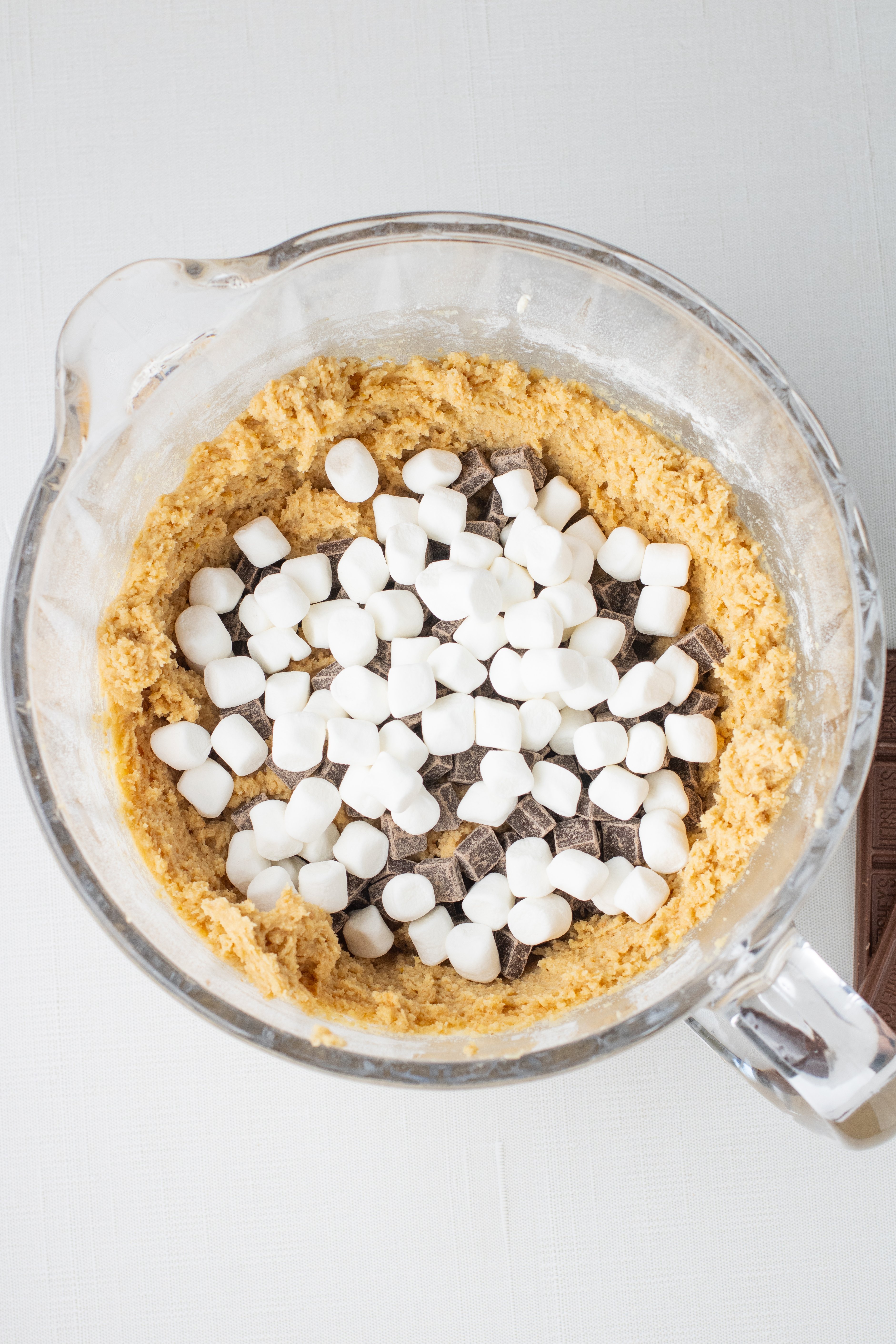 mini marshmallows and chocolate chunks added to cookie dough