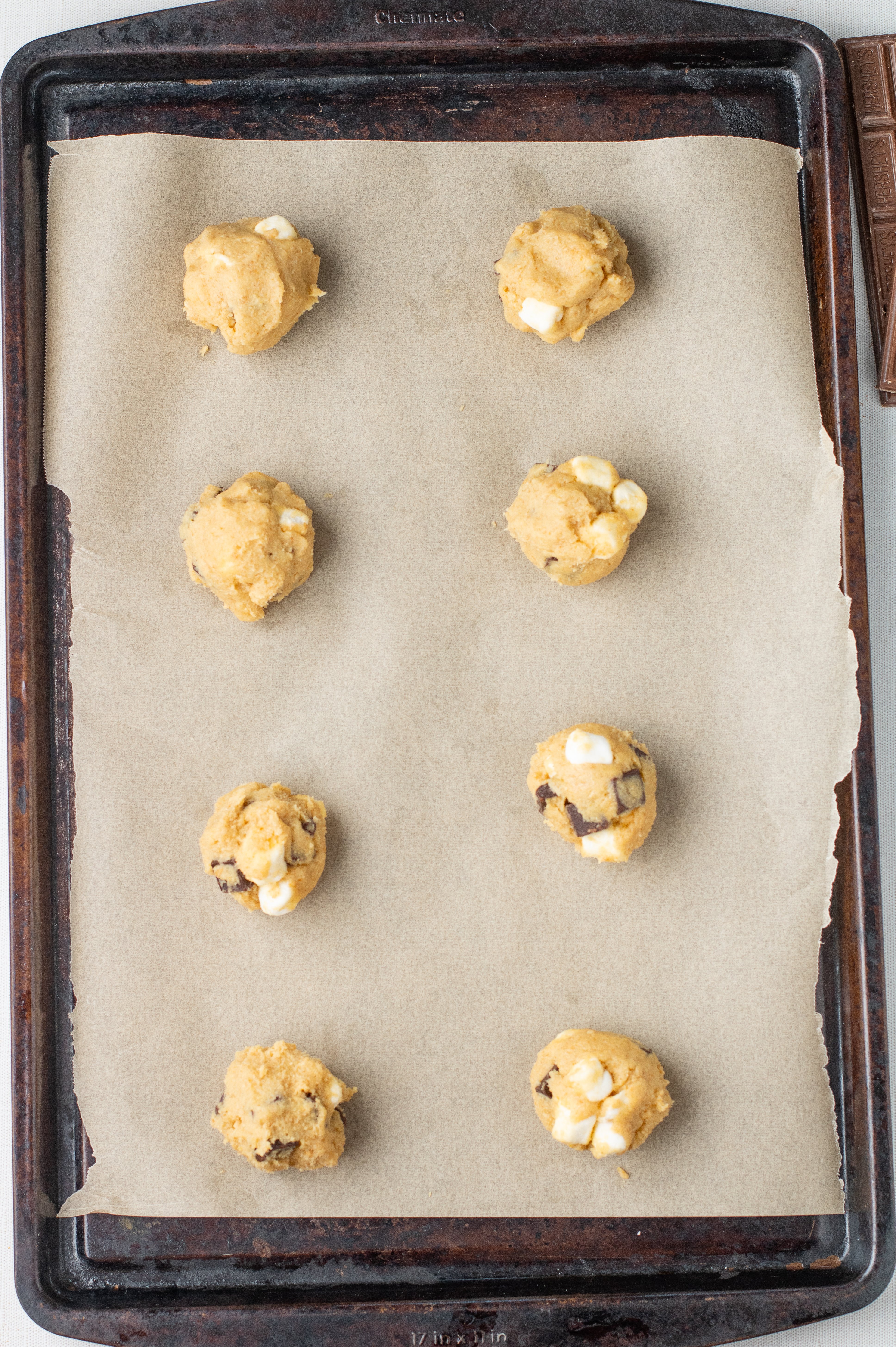 balls of smores cookie dough on a sheet
