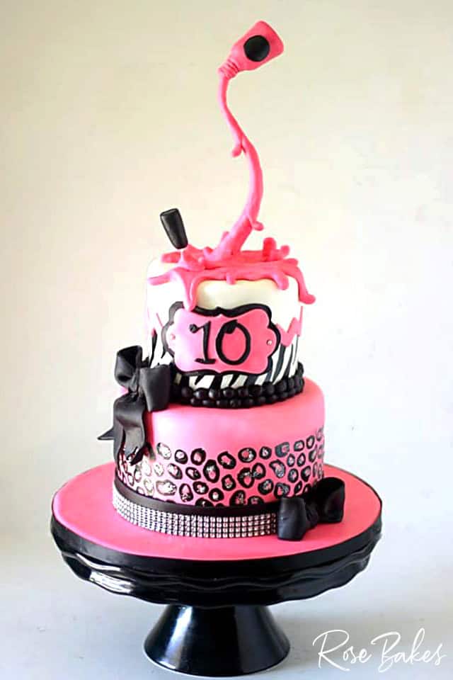 nail polish cake with rhinestones, leopard print and black bows
