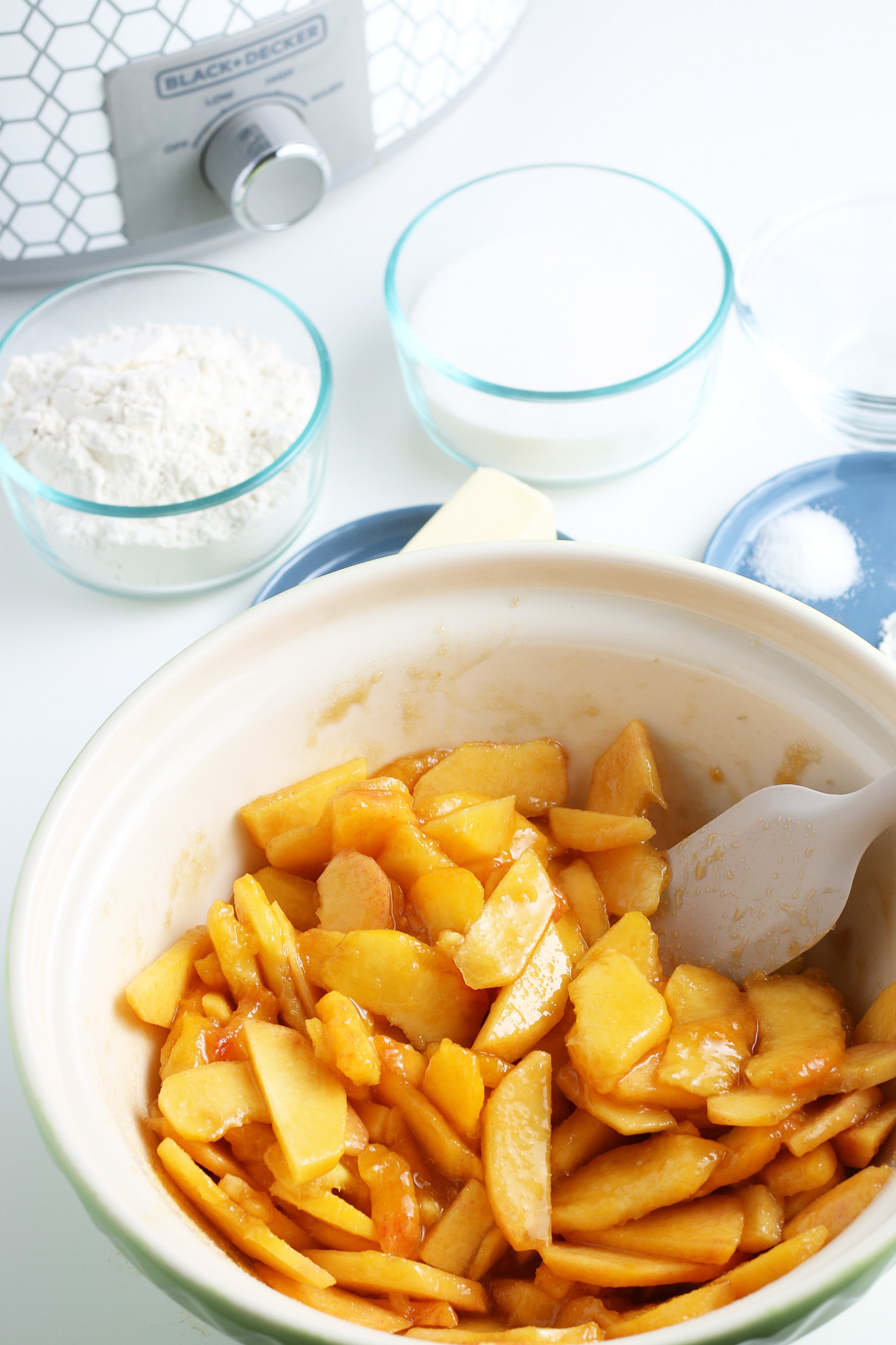 sliced peaches tossed with brown sugar