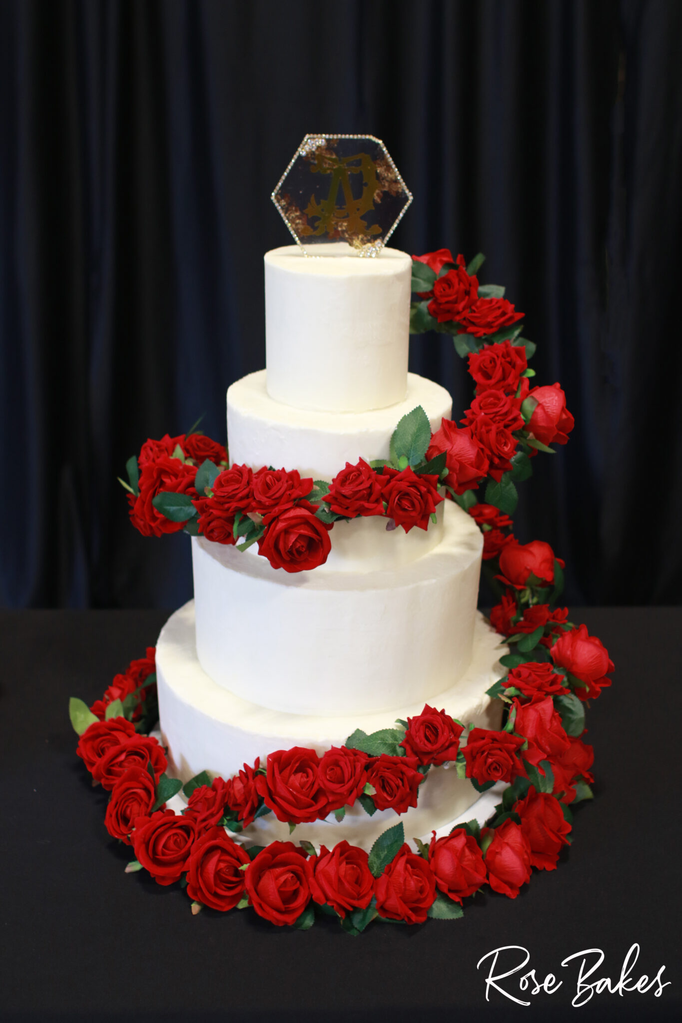 White-Buttercream-Wedding-Cake-with-Red-Roses-Wrapped