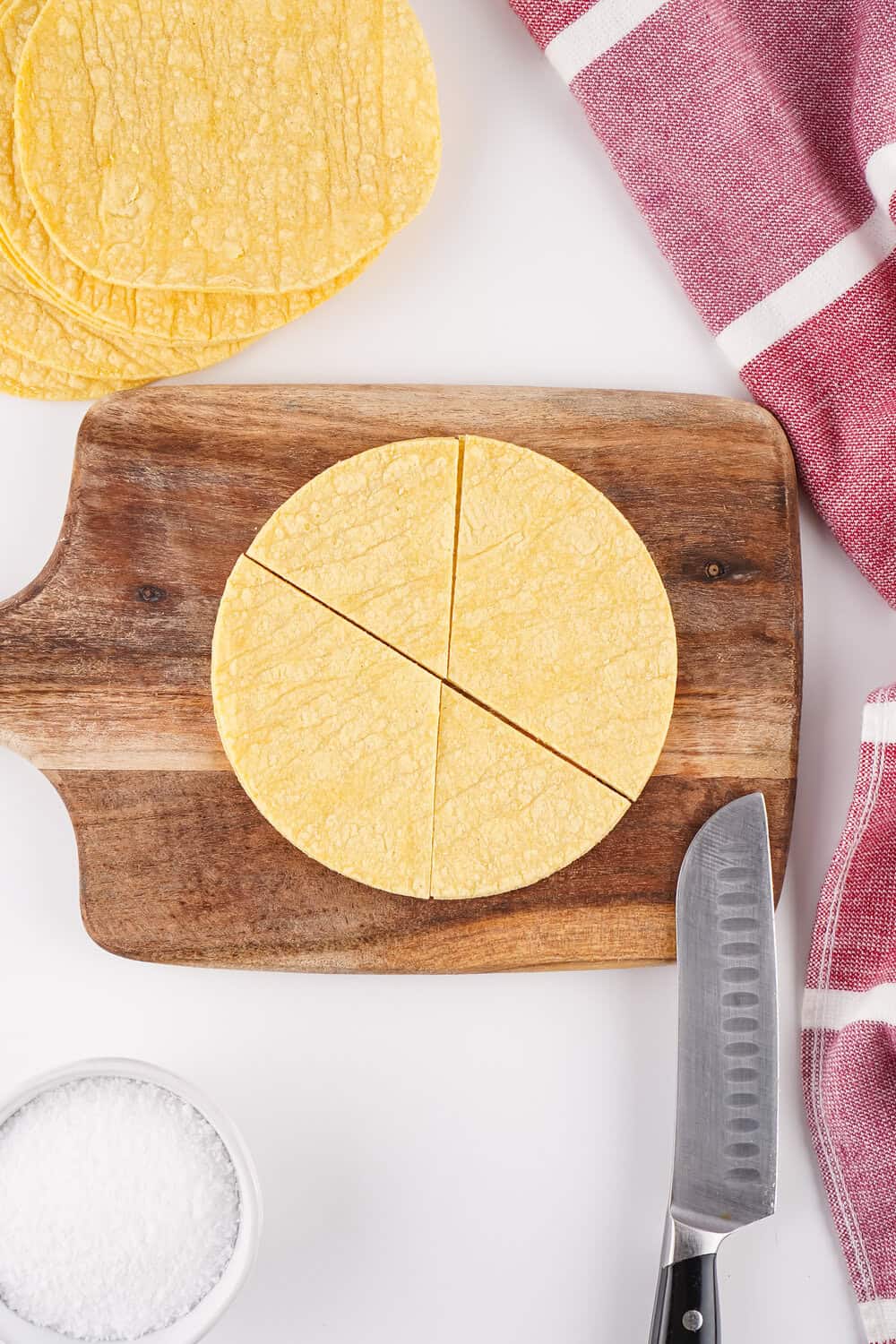 corn tortilla on cutting board cut like a pie