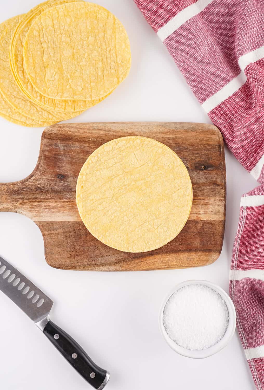 corn tortilla on cutting board