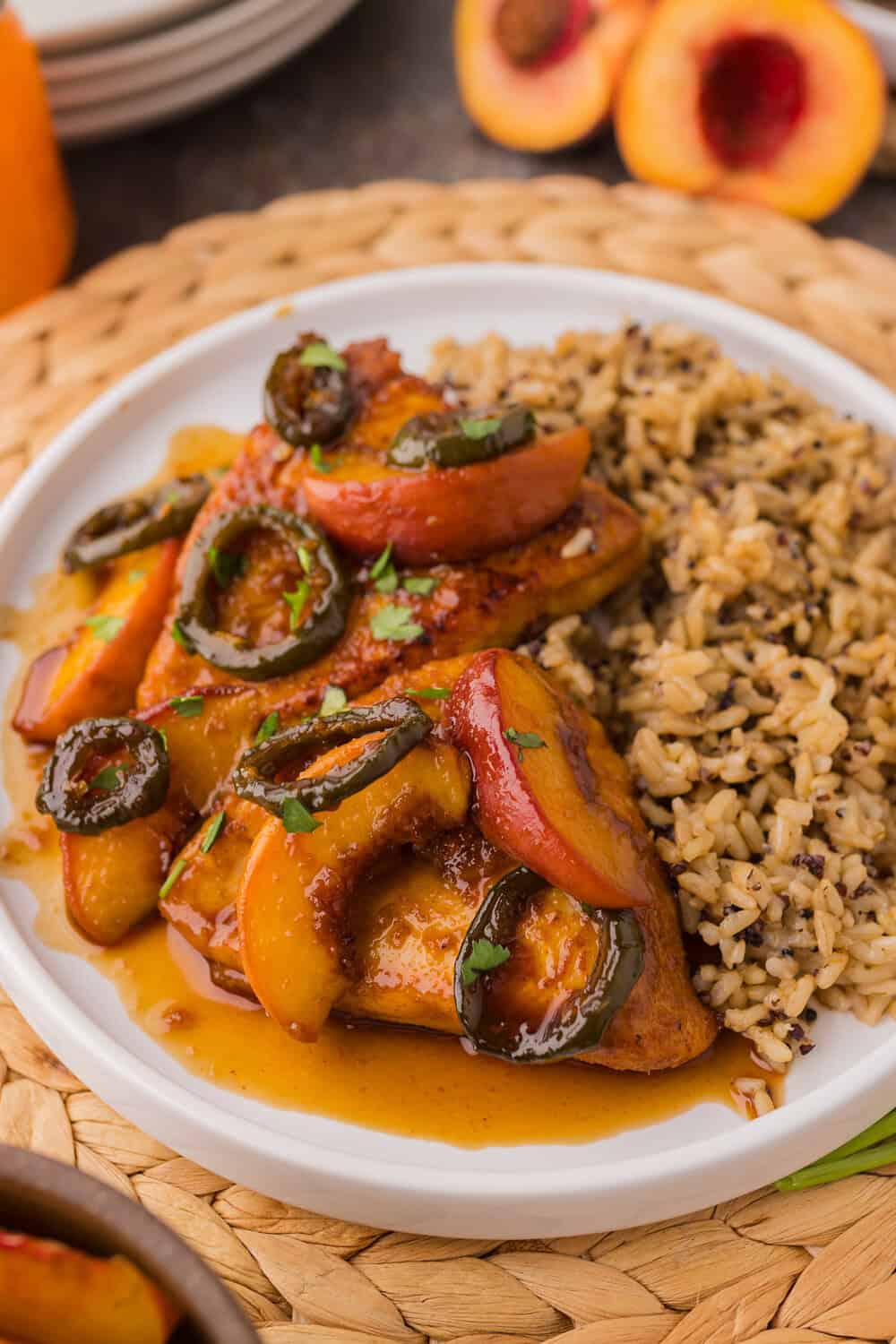 Peach Jalapeno Chicken with Wild Rice on a white plate