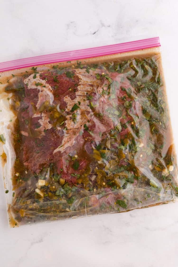 carne asada steak in bag of marinade