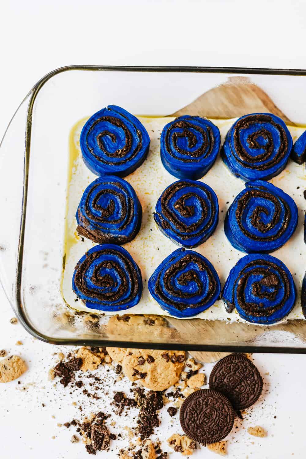 cinnamon rolls in heavy cream in baking dish