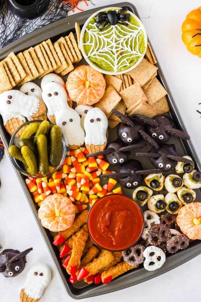 ghost and pumpkin snack board with dips