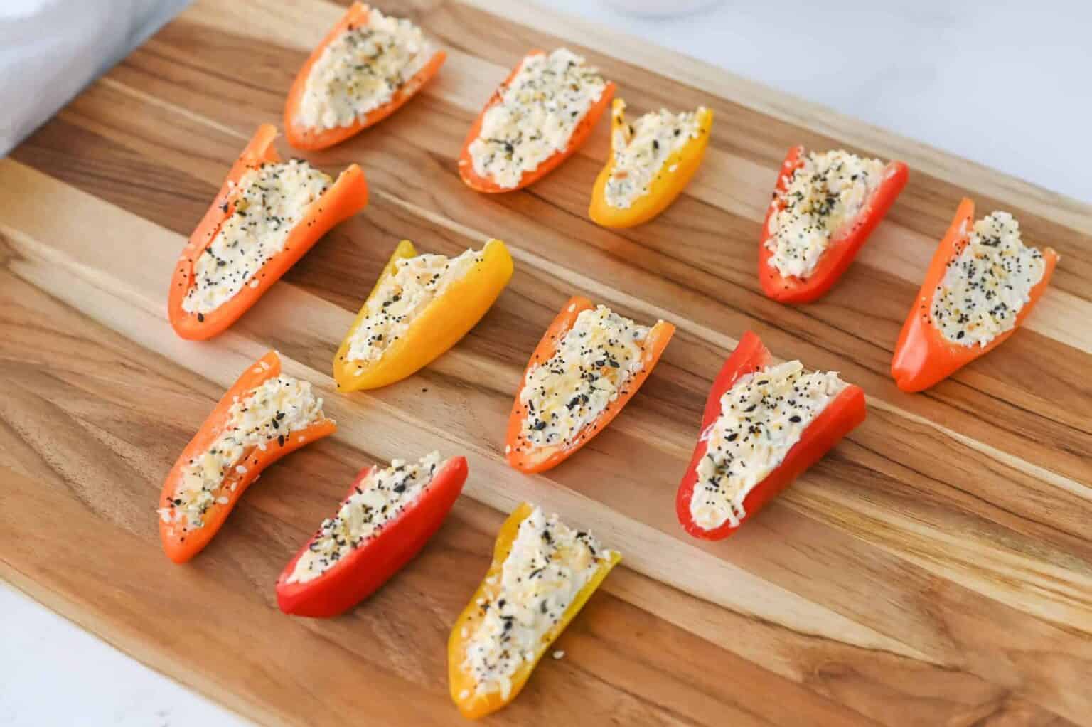 mini stuffed peppers on a cutting board