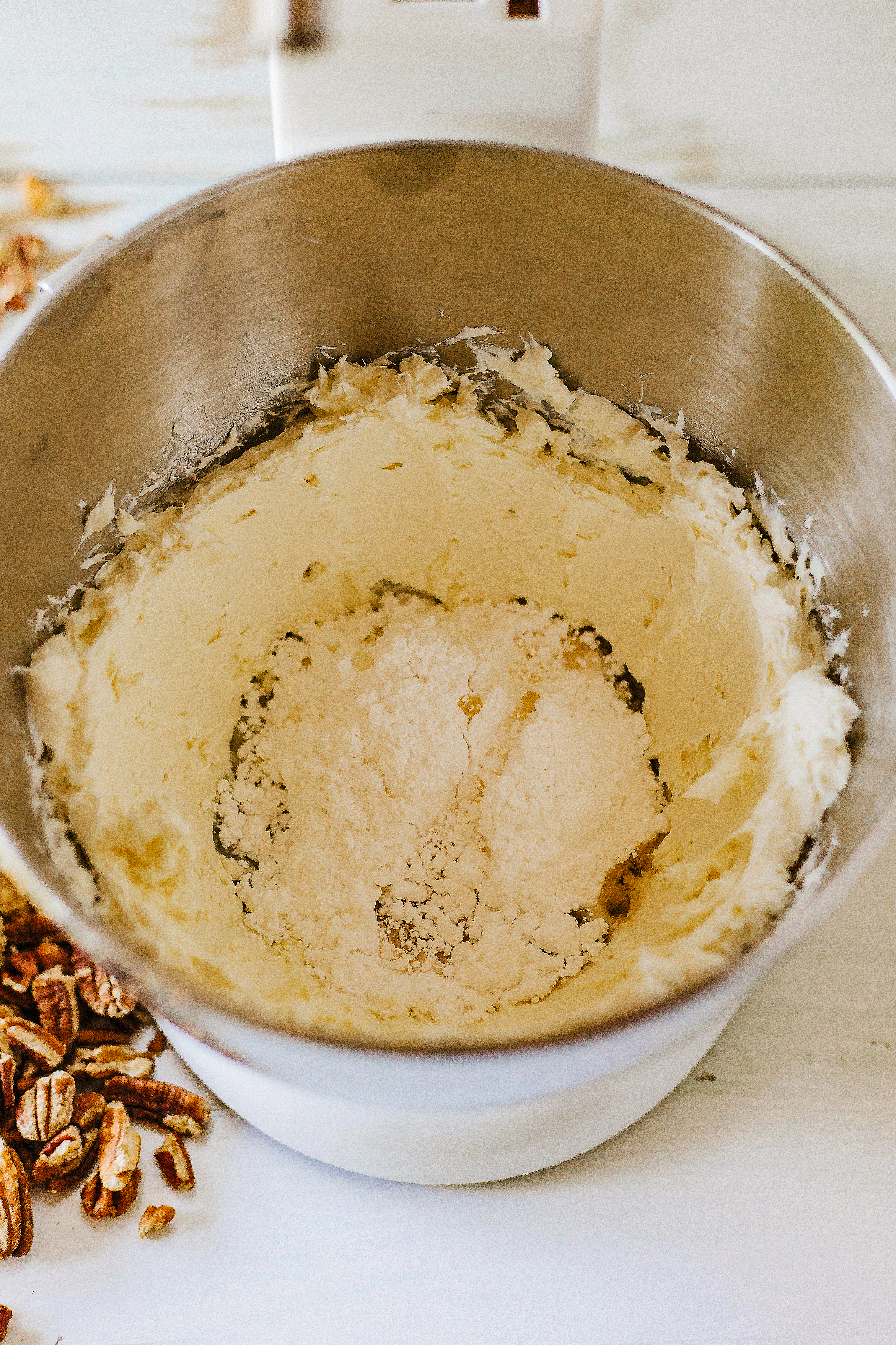 powdered sugar, lemon juice, caramel syrup, and heavy cream added to cream cheeese