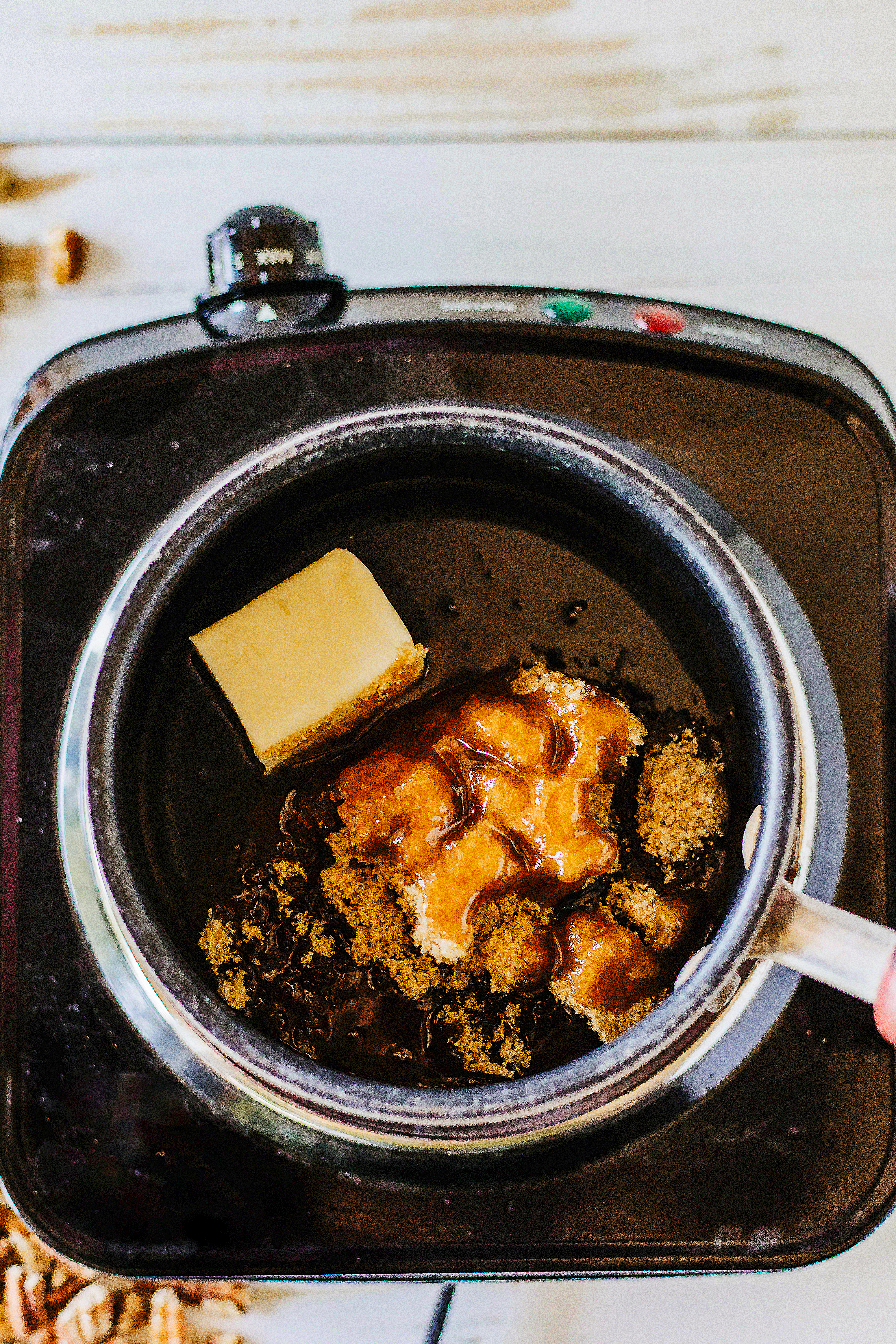 brown sugar, karo syrup, egg, butter, vanilla added to saucepan.
