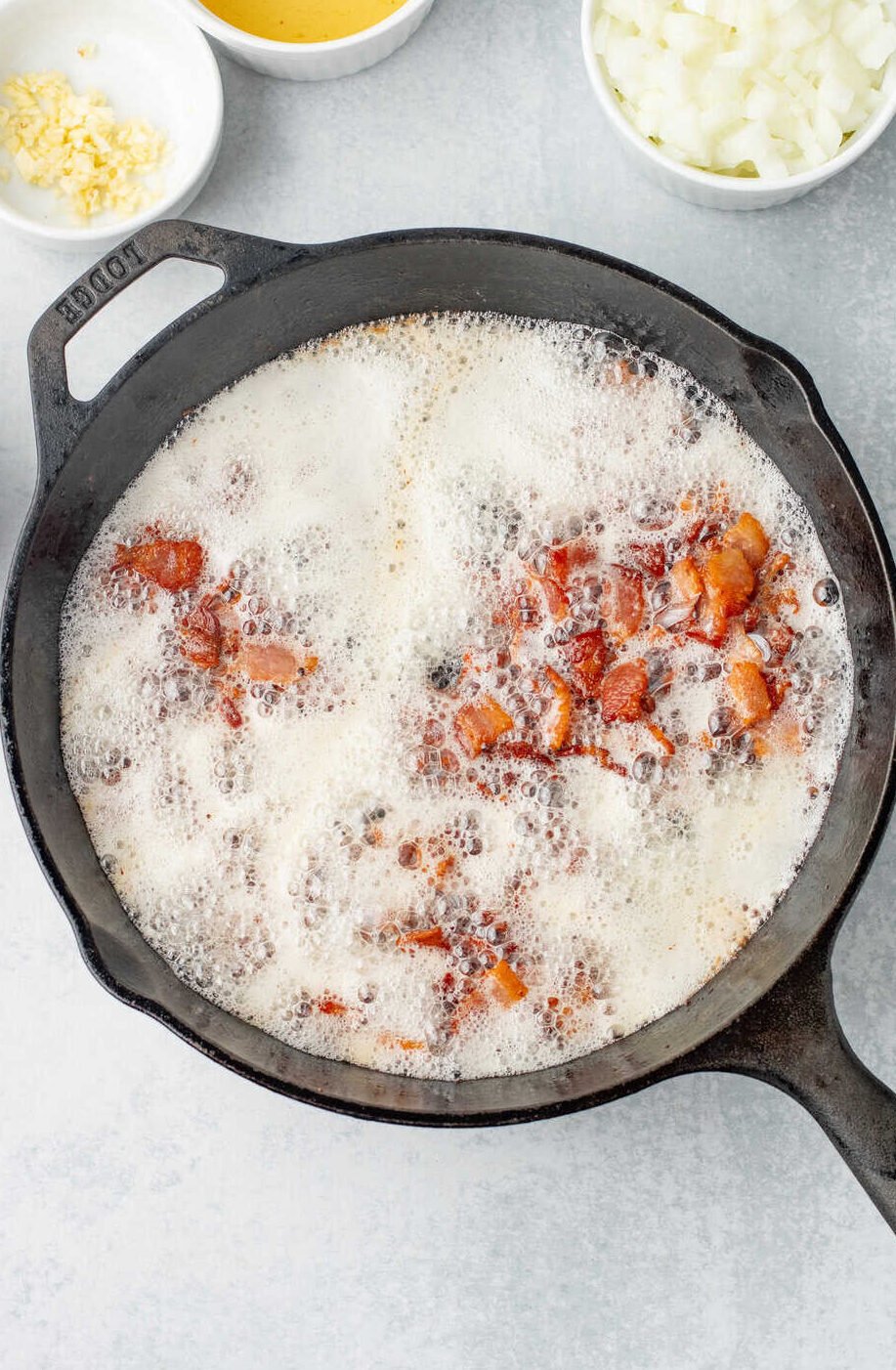 bacon cooking in a skillet