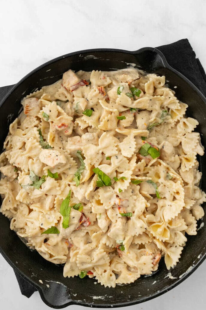 marry me chicken pasta garnished with fresh basil
