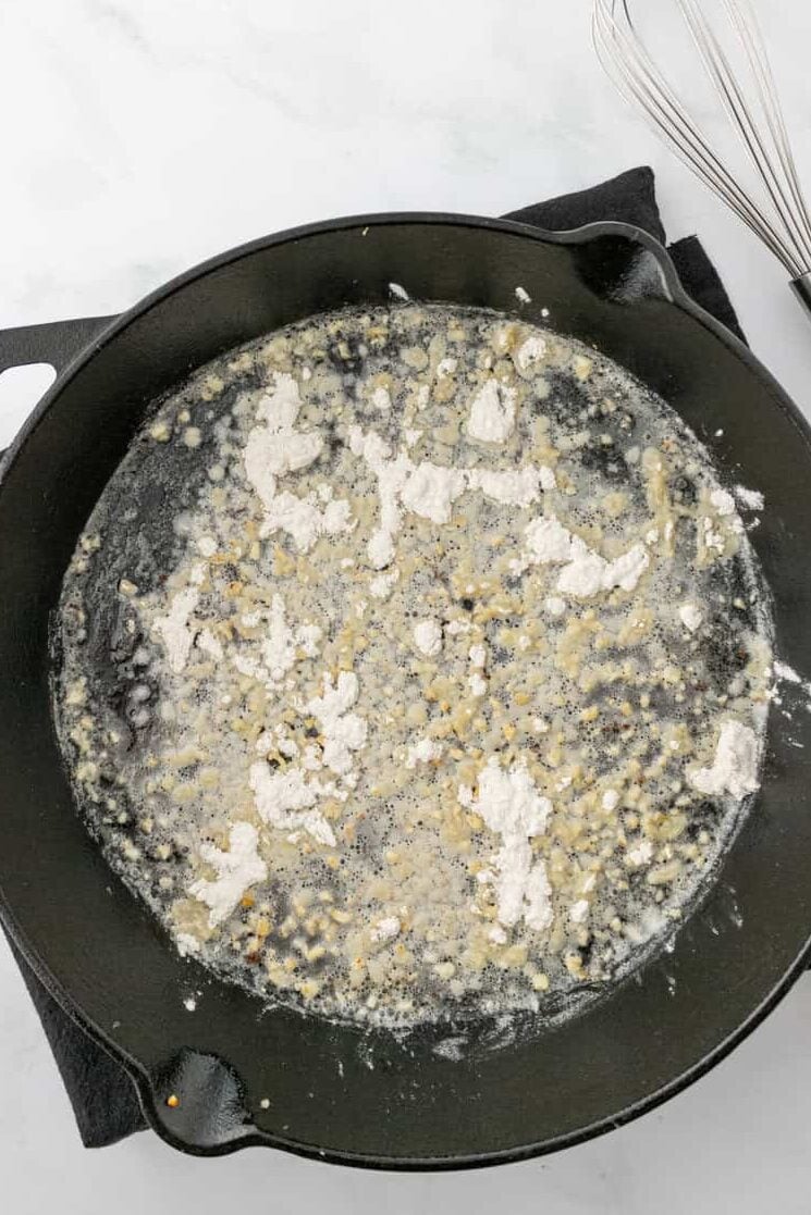 flour in melted butter in skillet