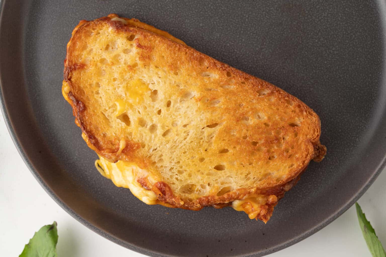 air fryer grilled cheese sandwich on a gray plate