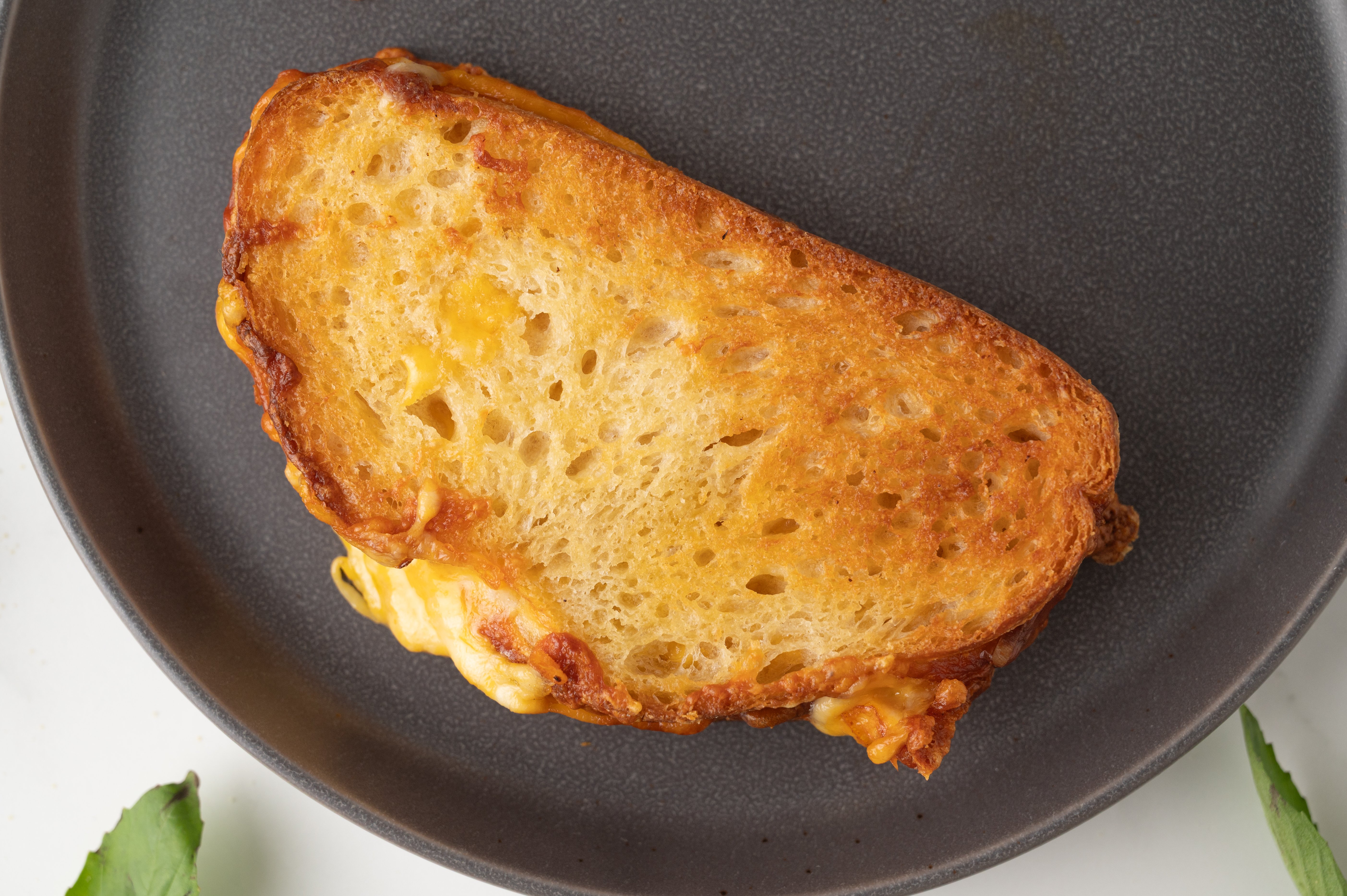 air fryer grilled cheese sandwich on a gray plate