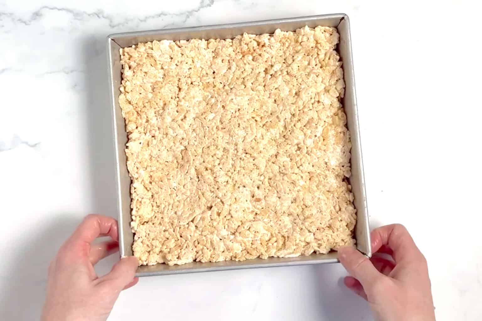 brown butter rice krispie treats pressed into pan