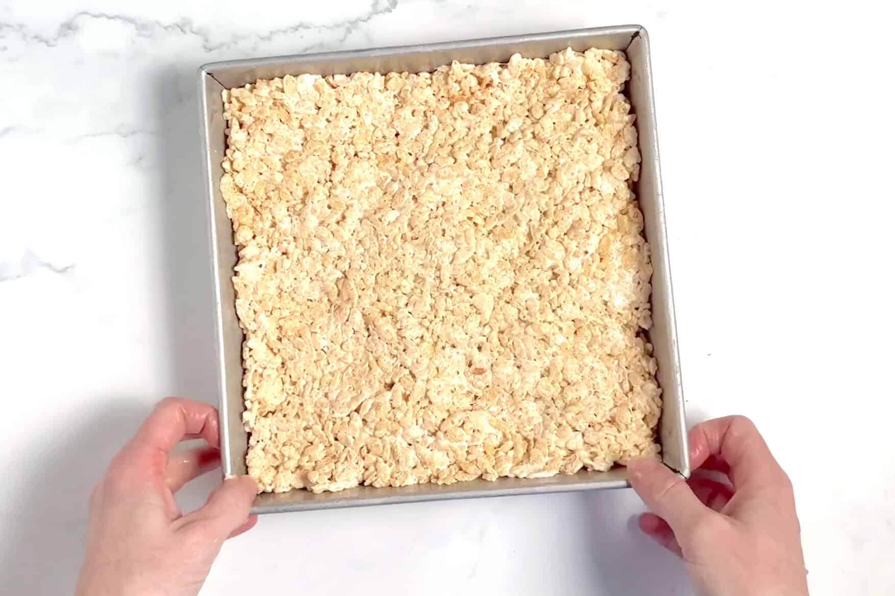 brown butter rice krispie treats pressed into pan