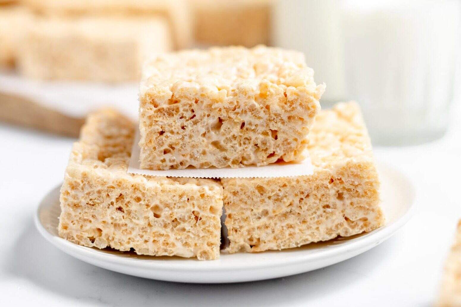 brown butter rice krispies treats stacked on a plate