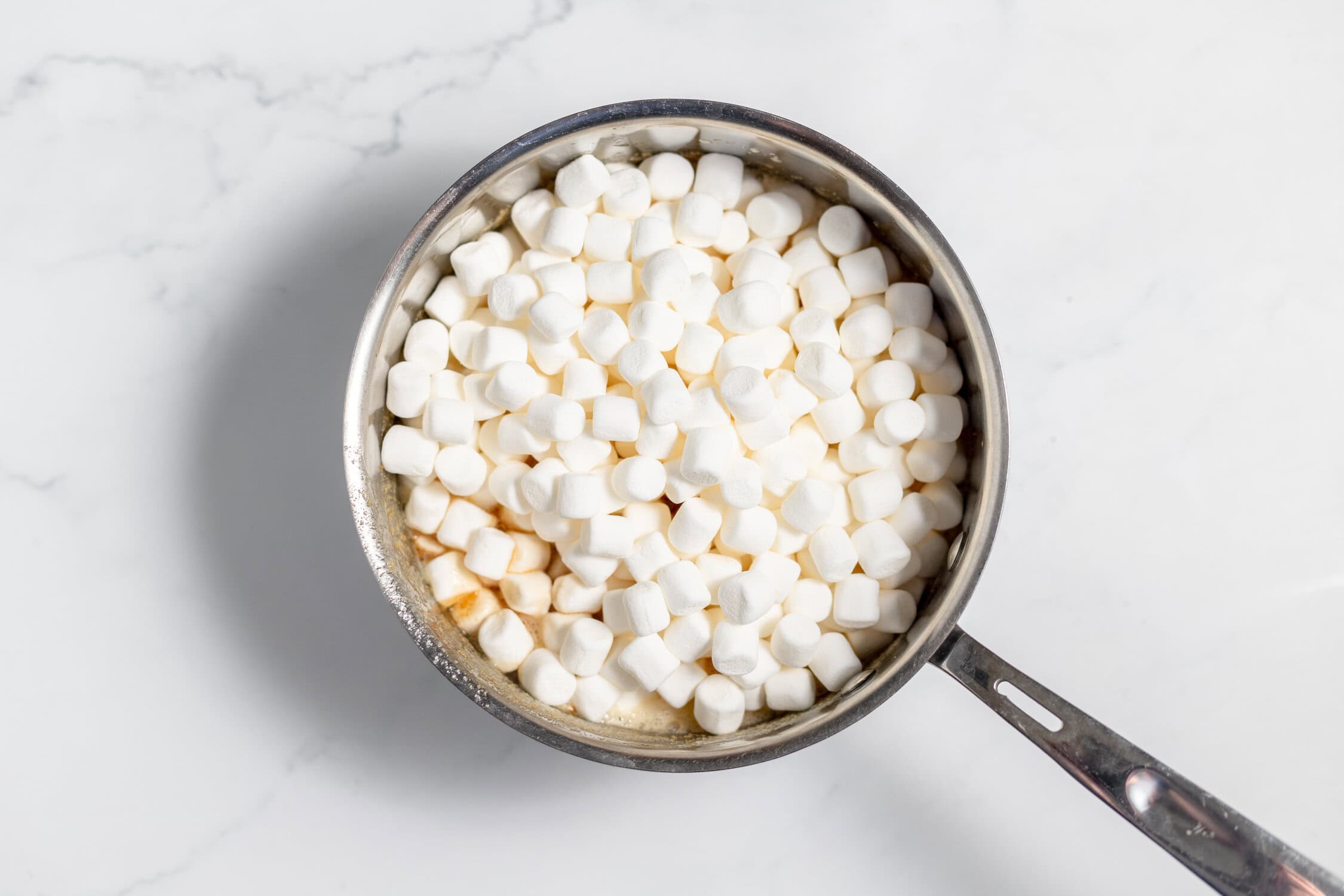 marshmallows added to melted butter