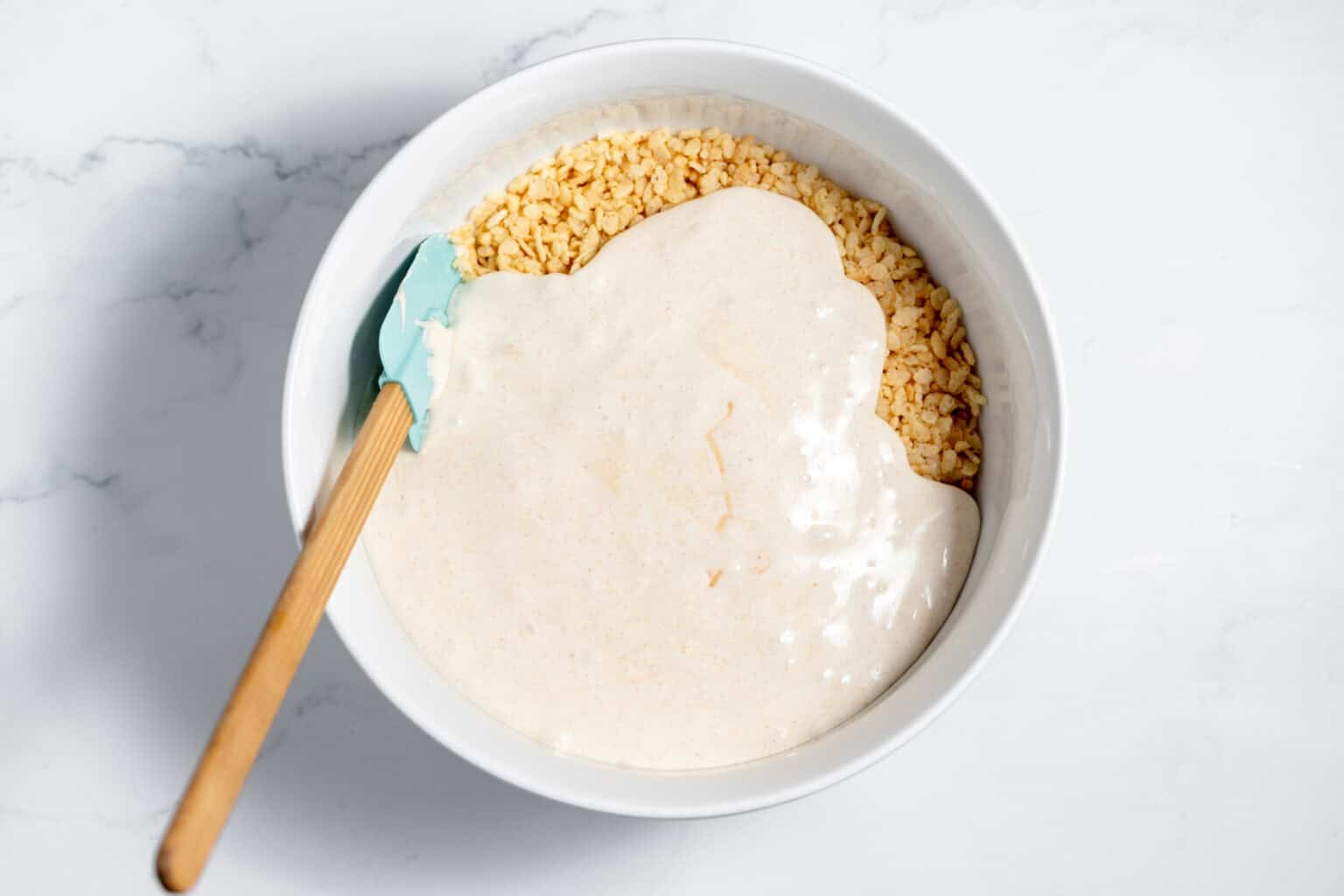 browned butter marshmallow mixture poured over rice krispies